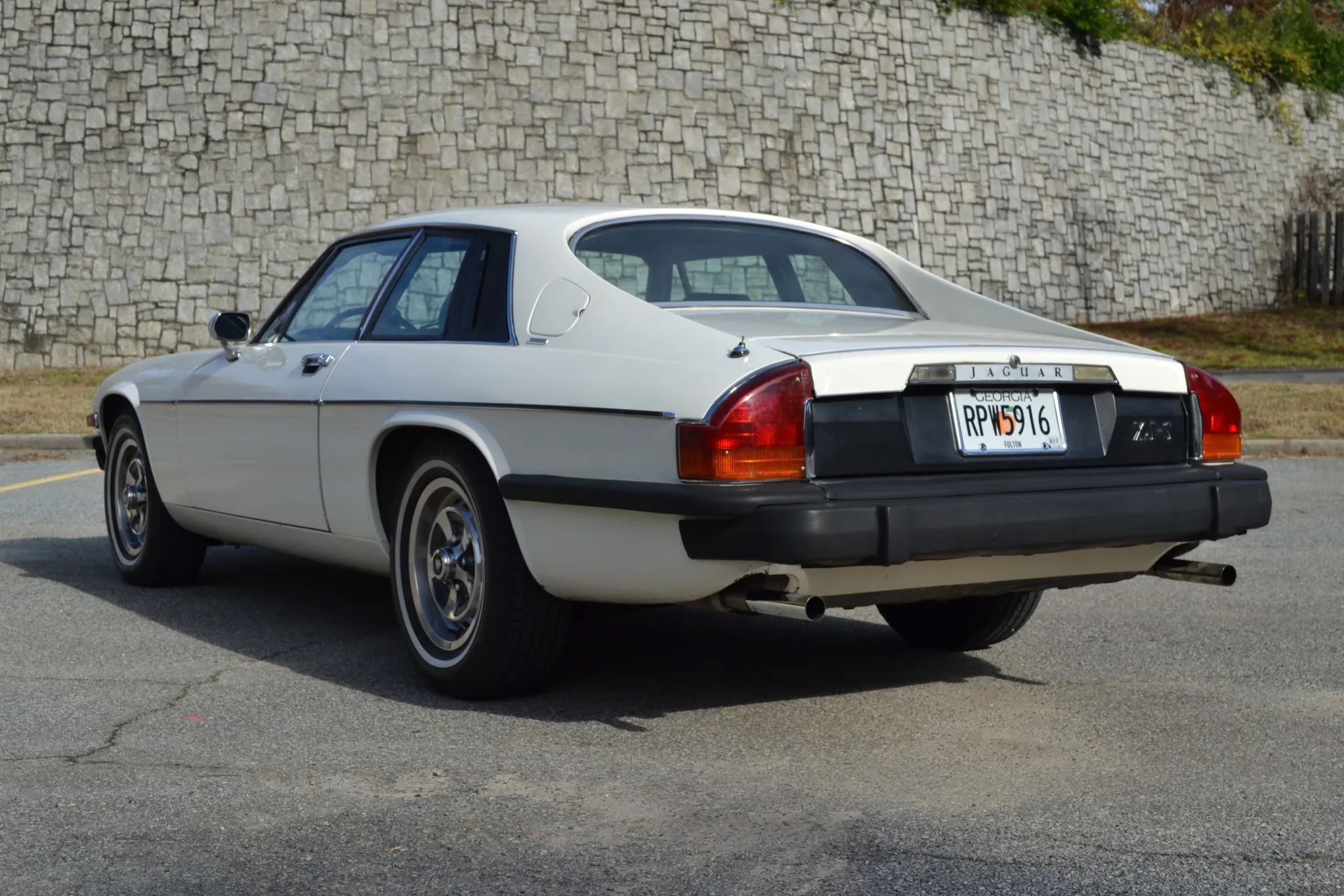 White 1976 Jaguar XJ-S from driver's rear three-quarter view
