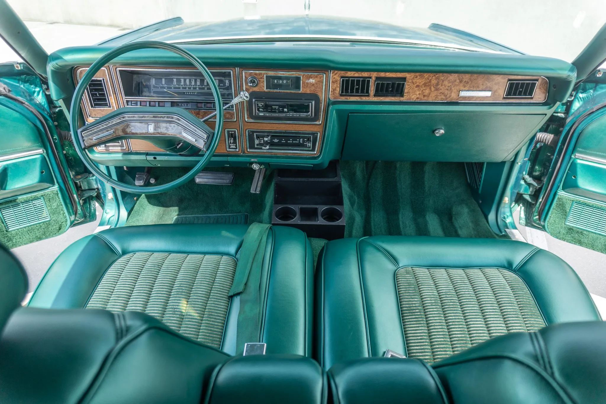 Dashboard and front seat of a 1977 Mercury