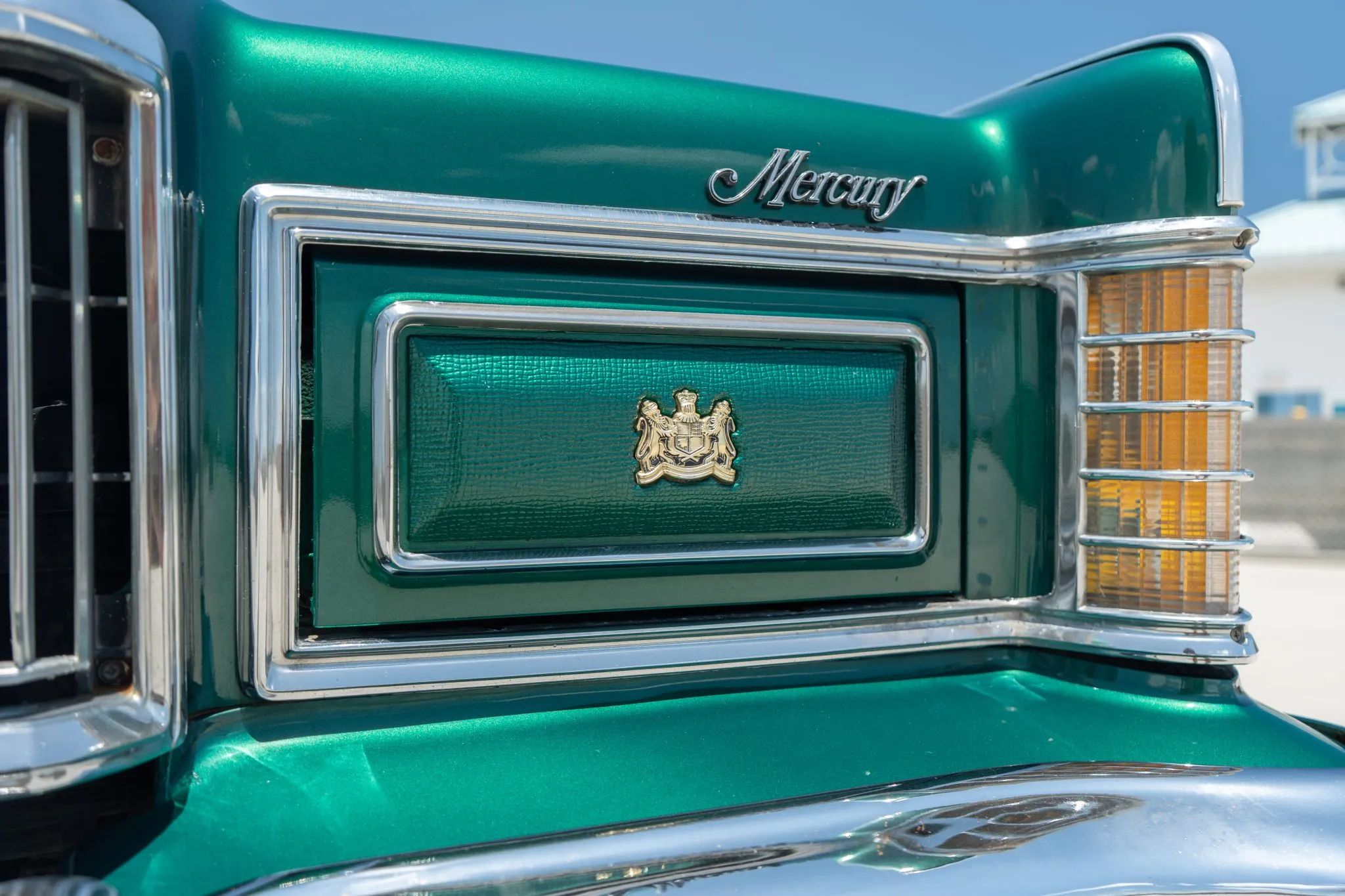 Concealed headlight of a 1977 Grand Marquis, with a texture vinyl covering on the headlamp cover