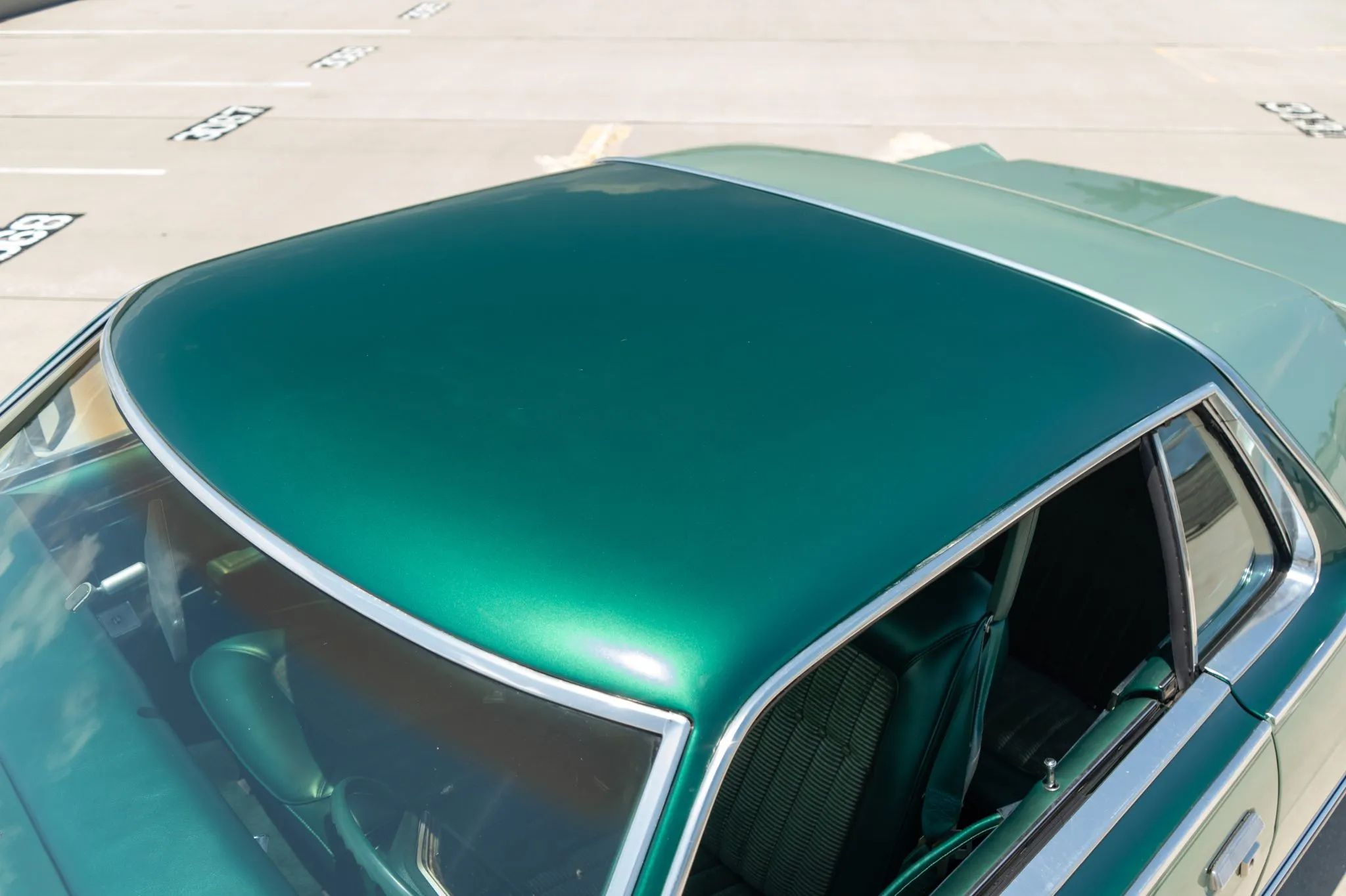 Roof of a two-tone green 1977 Grand Marquis hardtop