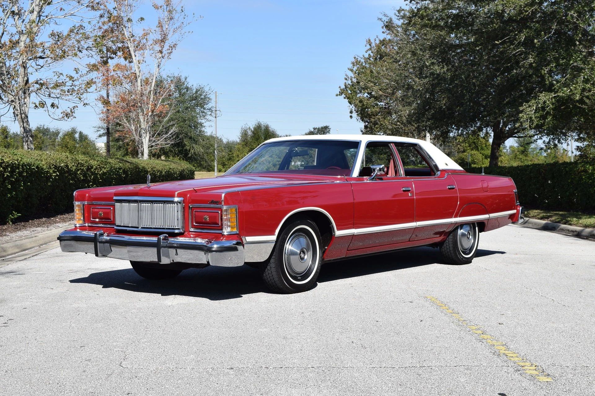 Left front 3q view of a Dark Red 1977 Mercury Grand Marquis four-door
