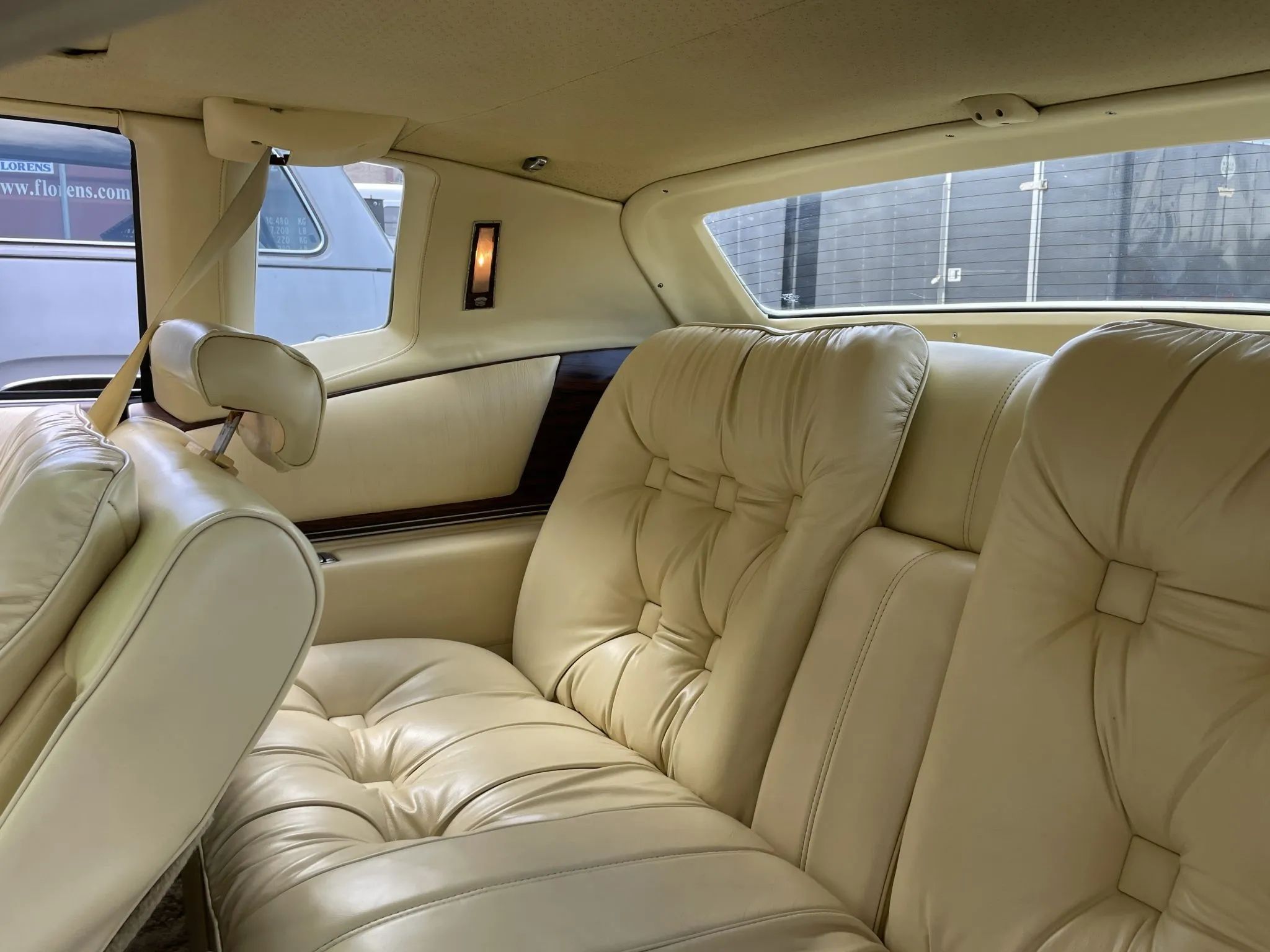 Back seat of a 1978 Eldorado Biarritz, showing the wide plastic cap bolted around the rear window