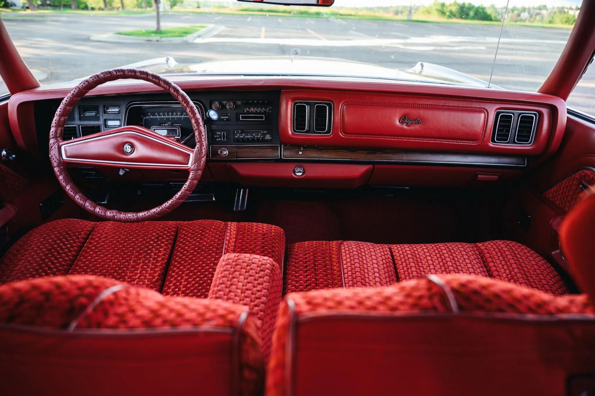 Dashboard and front seat of a 1978 Chrysler, seen from the back seat looking forward