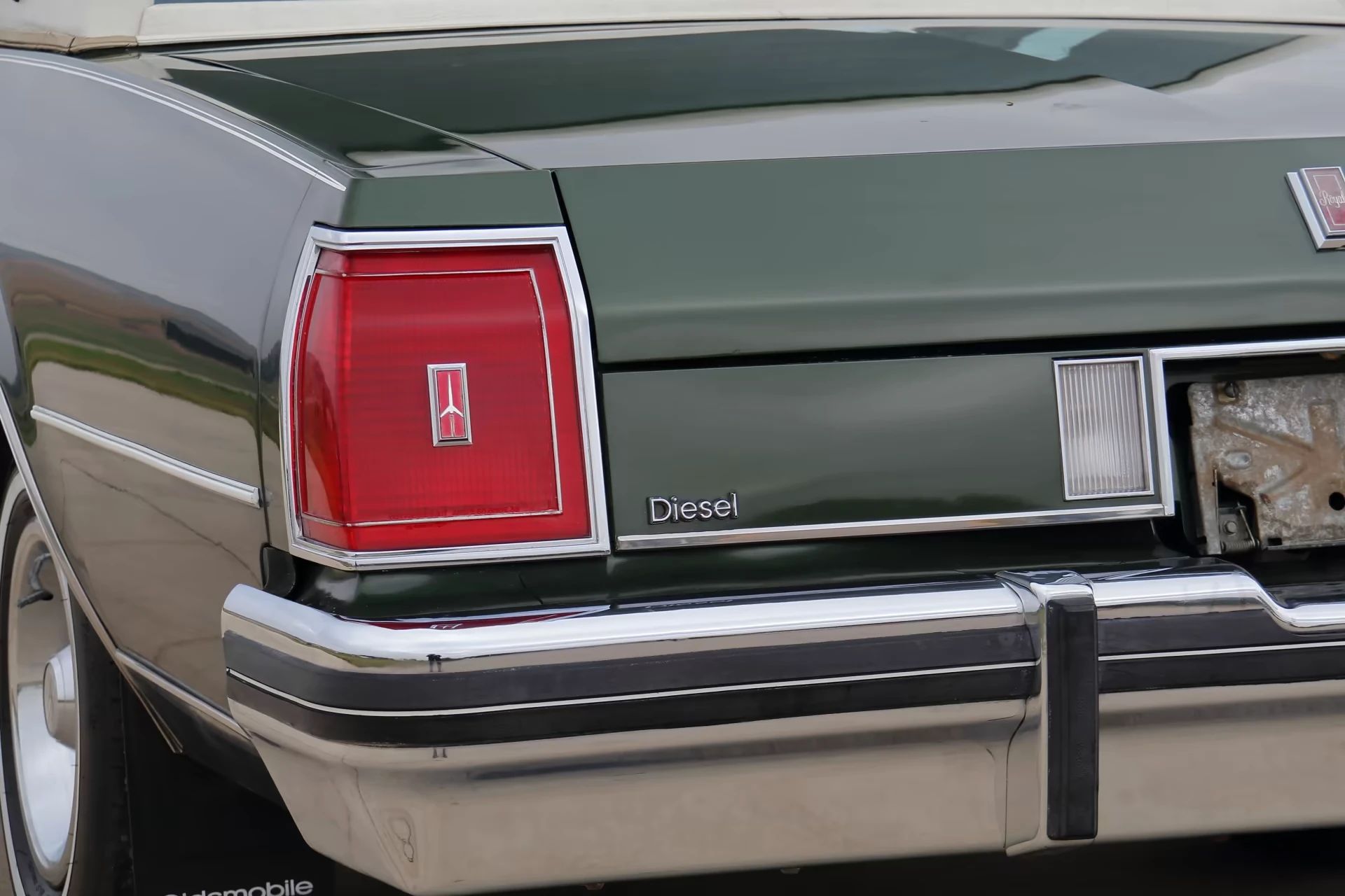 1980 Oldsmobile Delta 88 Royale Coupe With Diesel V-8: Disco-Era Diesel Survivor 9 Left taillight and "DIESEL" decklid badge on a 1980 Oldsmobile
