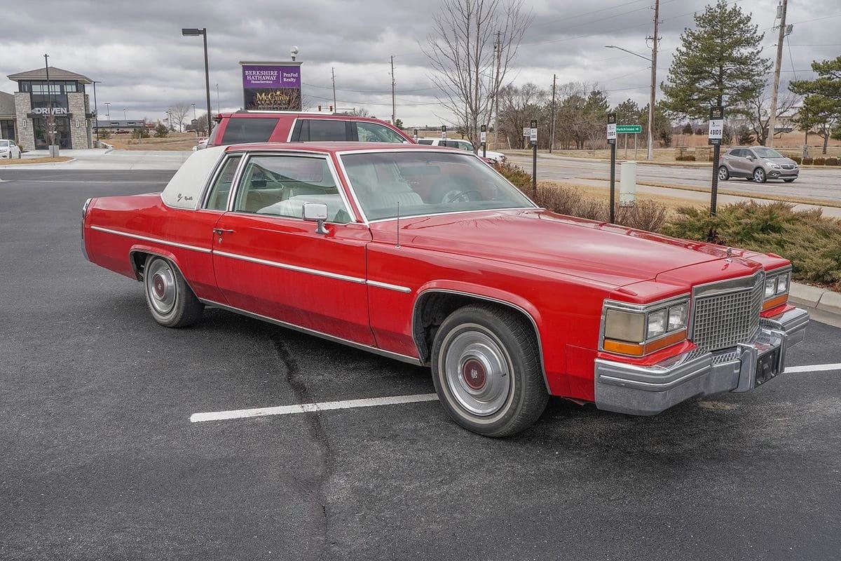 Right front 3q view of a red 1981 Cadillac Coupe de Ville