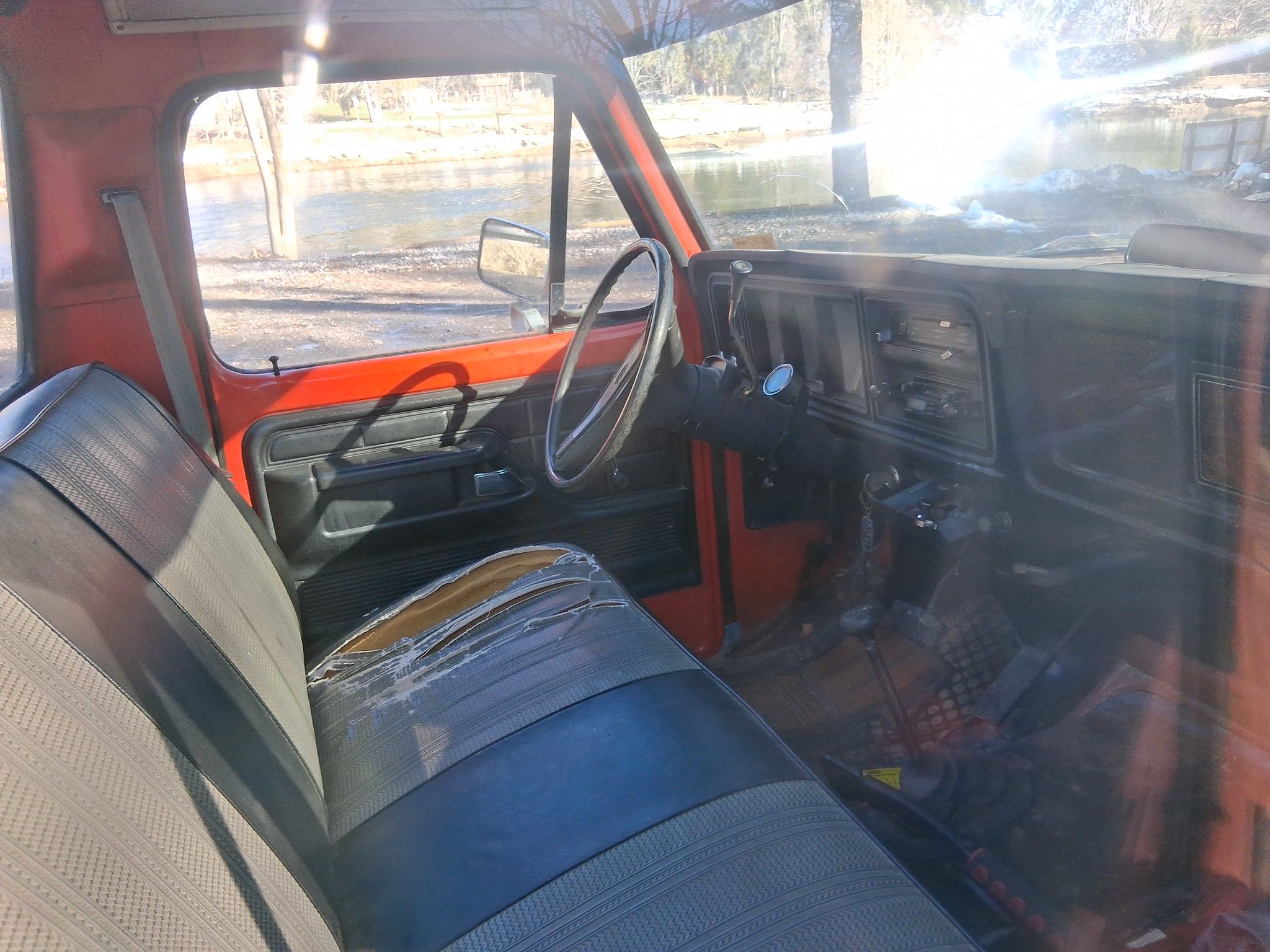 Image of 1979 Ford F-250 interior in coral and black