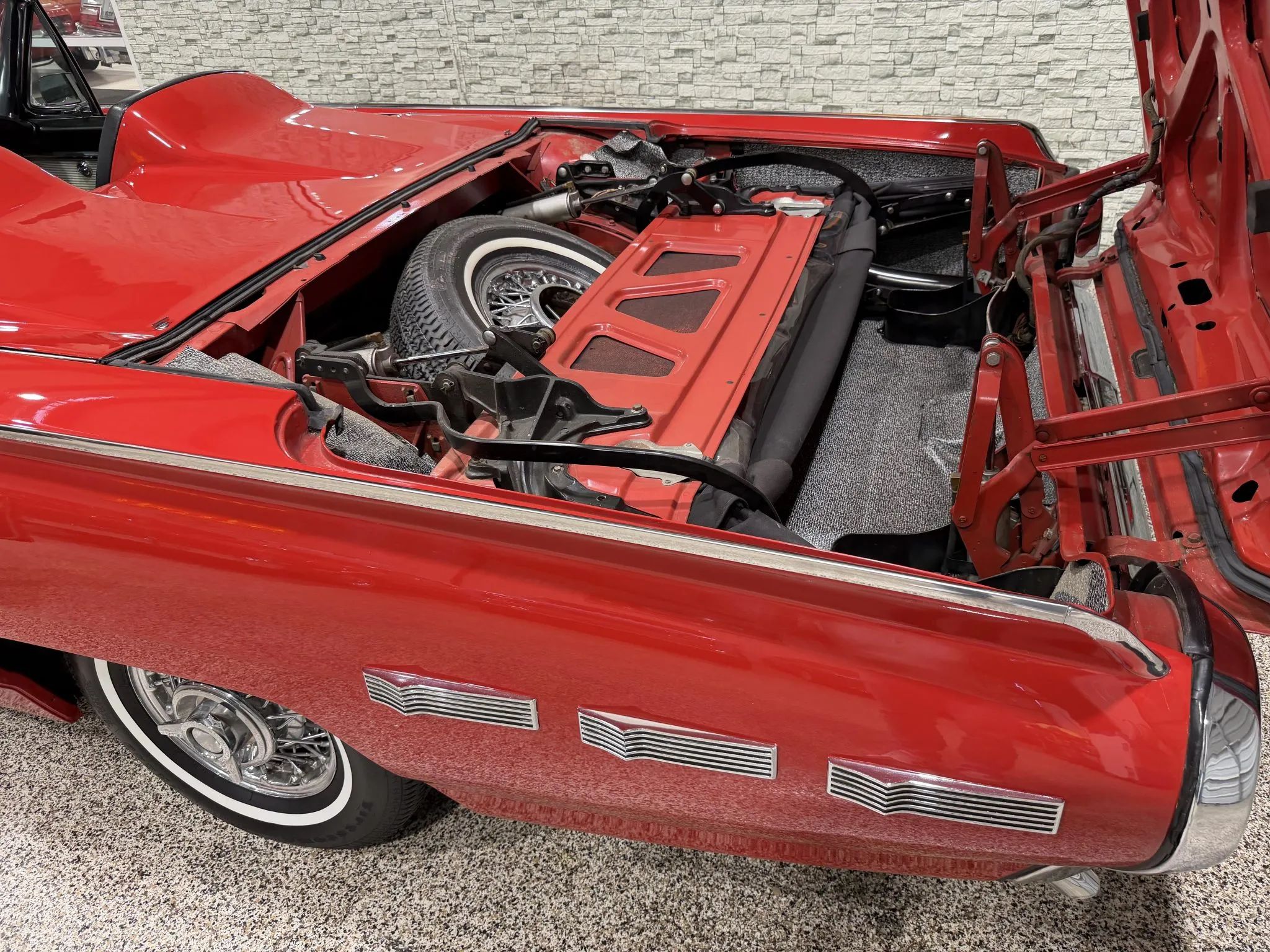 Luggage compartment of 1962 Ford Thunderbird Sports Roadster with top down