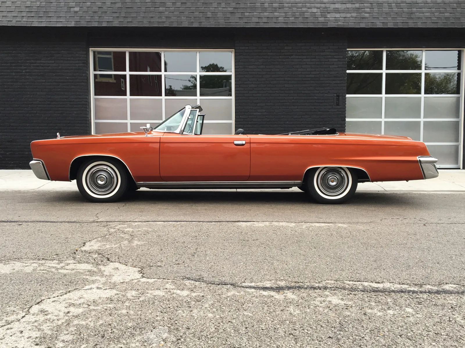 Picture of copper 1966 Imperial Crown Convertible in profile