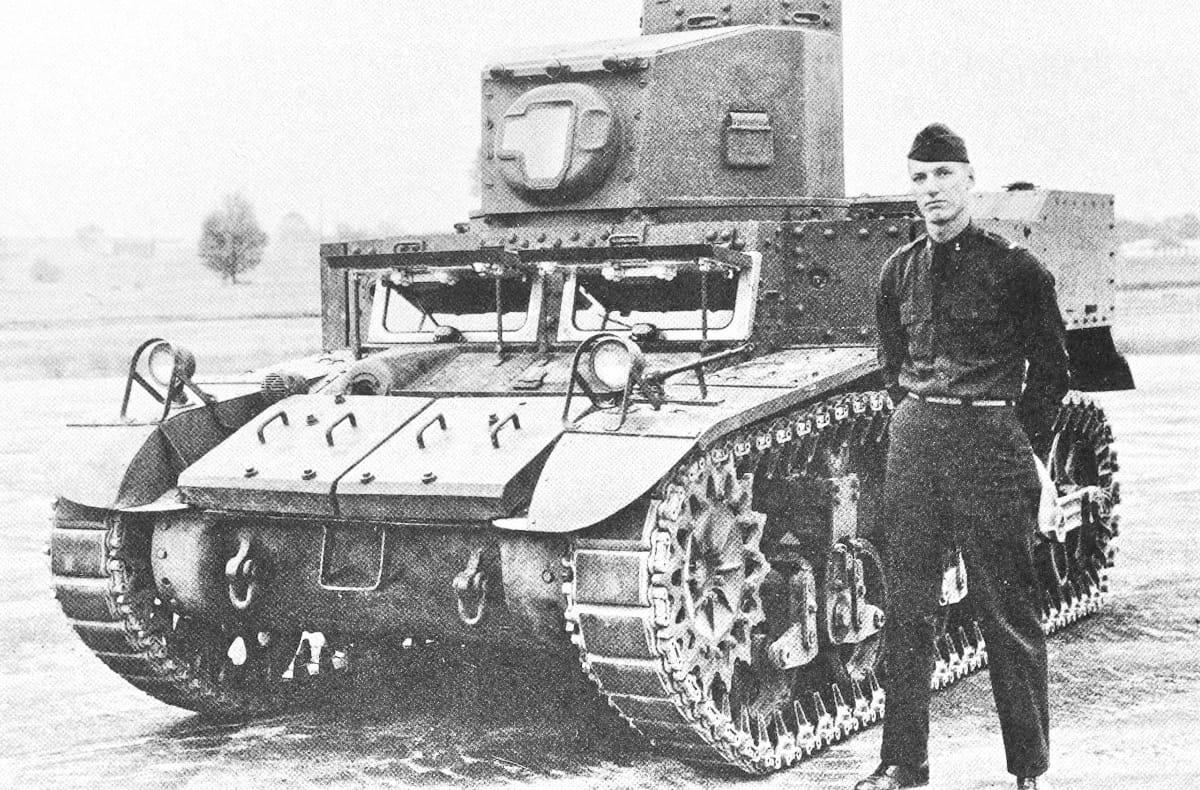 This WW2 Tank Is Powered By Twin Cadillac Engines And Hydra-Matic Transmissions, And It Was Parked Down The Street 7 B&W photo of a soldier standing next to a prototype light tank