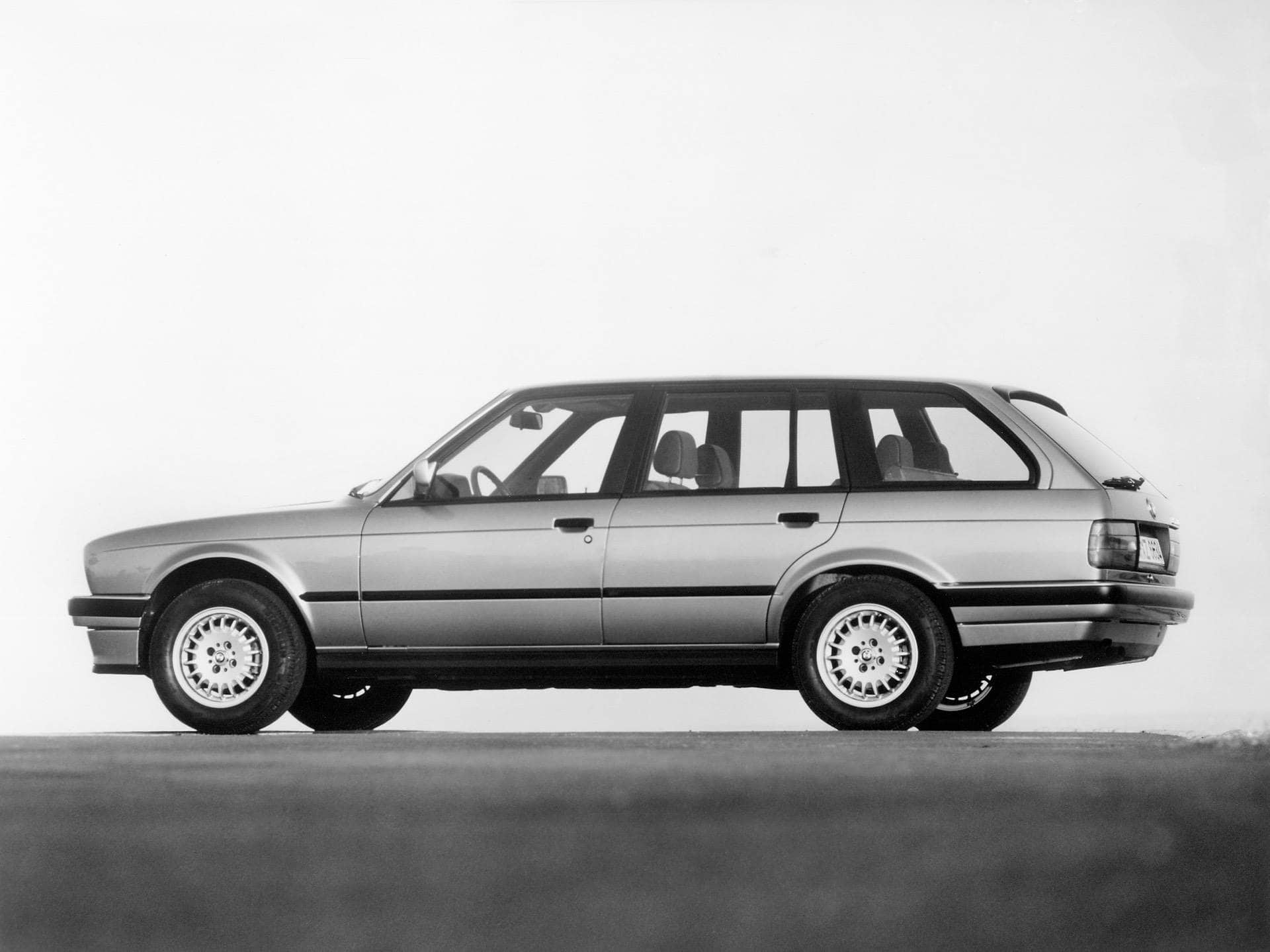 Two-Door vs. Four-Door Cars - The Long-Running War Between Germany And France 50 a bmw 325ix touring e30 01