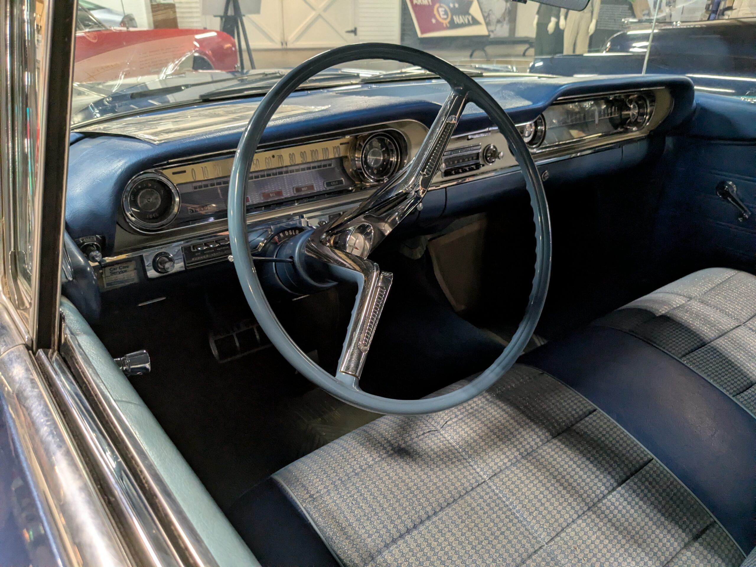 Dashboard of blue 1960 Oldsmobile Super 88