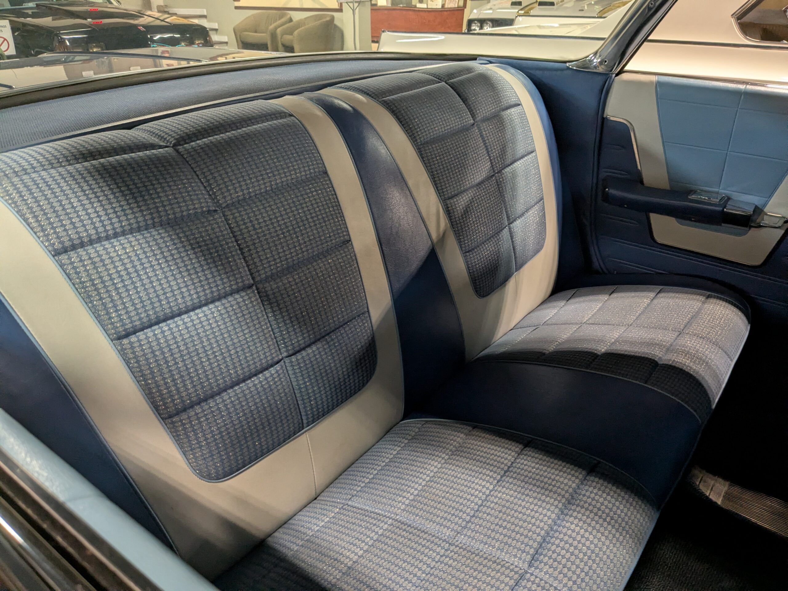 Rear seat of blue 1960 Oldsmobile Super 88
