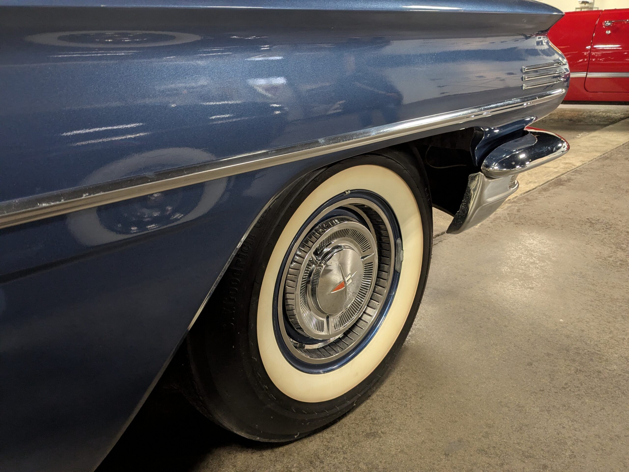 Passenger front fender closeup of blue 1960 Oldsmobile Super 88