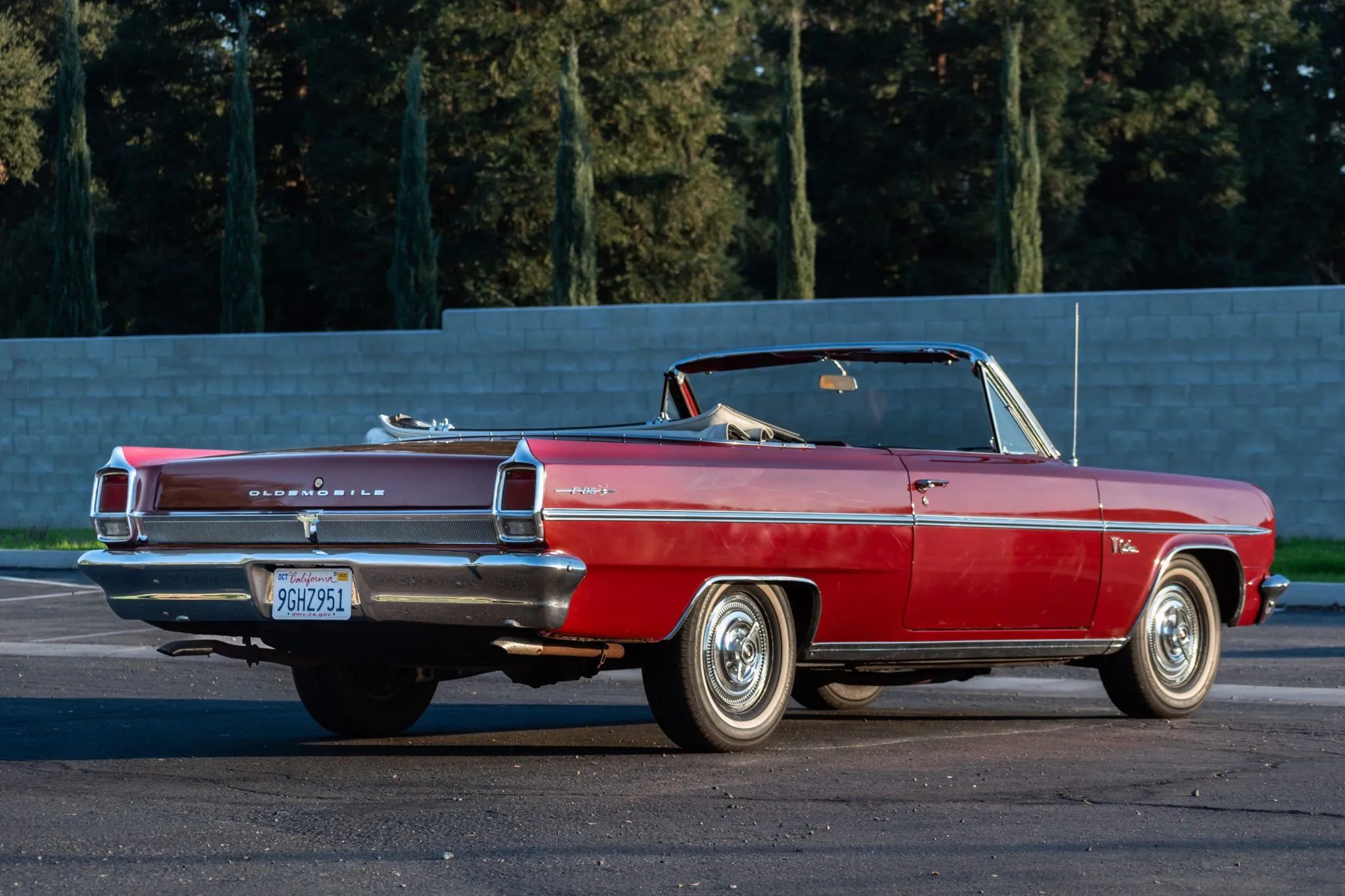 1963 Oldsmobile F-85 Cutlass Convertible With Aluminum V-8 And 4-Speed: Not Quite A 4-4-2 10 Right rear 3q view of a 1963 Olds Cutlass convertible with the top down