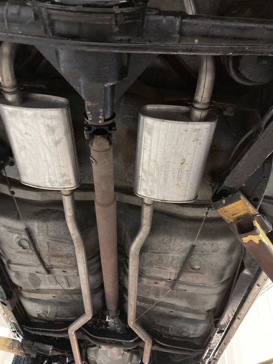 Dual exhaust system on a 1964 Olds Cutlass