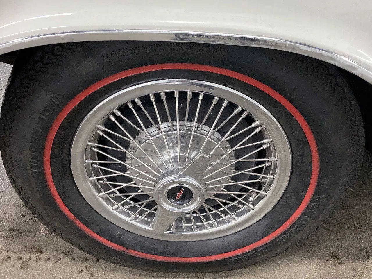 Redline tire and wire wheel cover