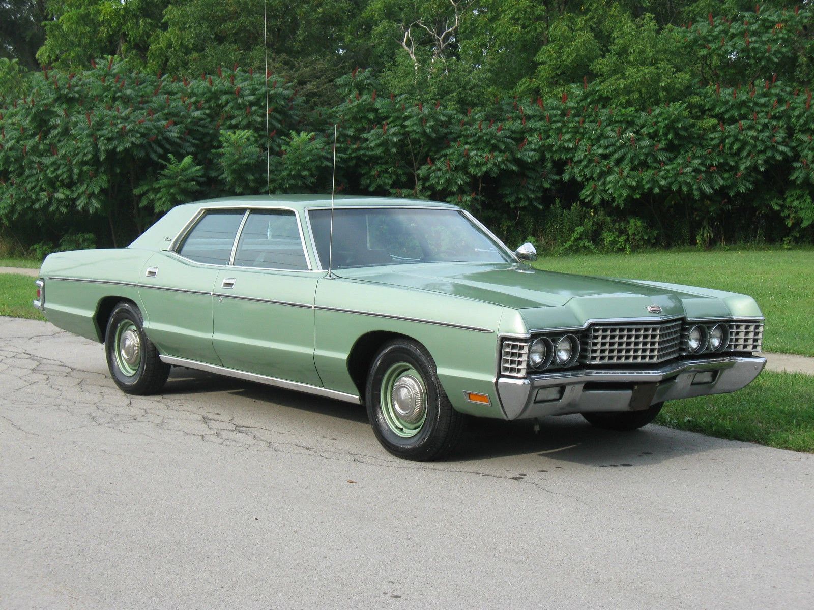 Right front 3q view of a green 1972 Mercury Monterey sedan