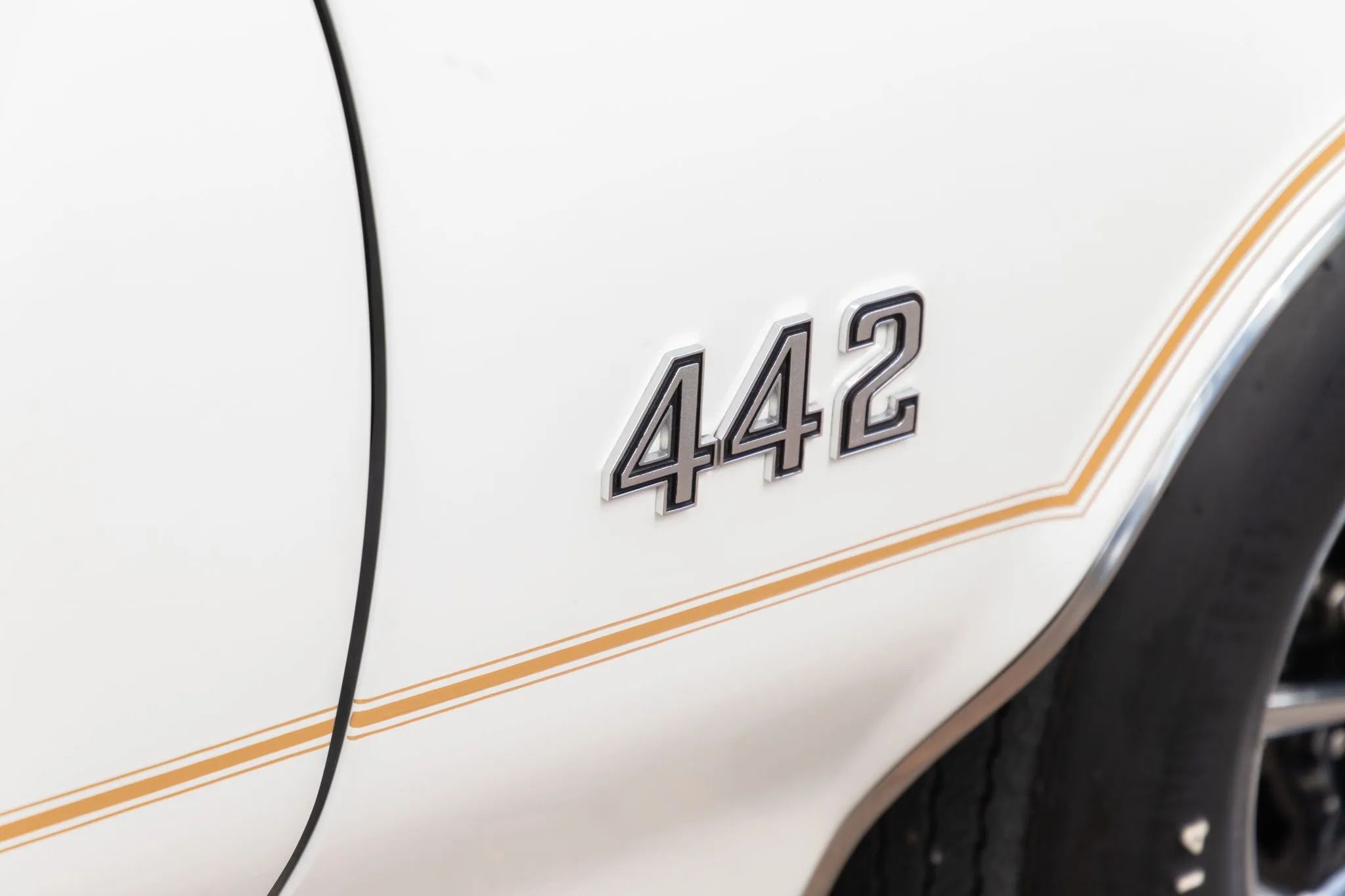 "442" fender badge on a white car