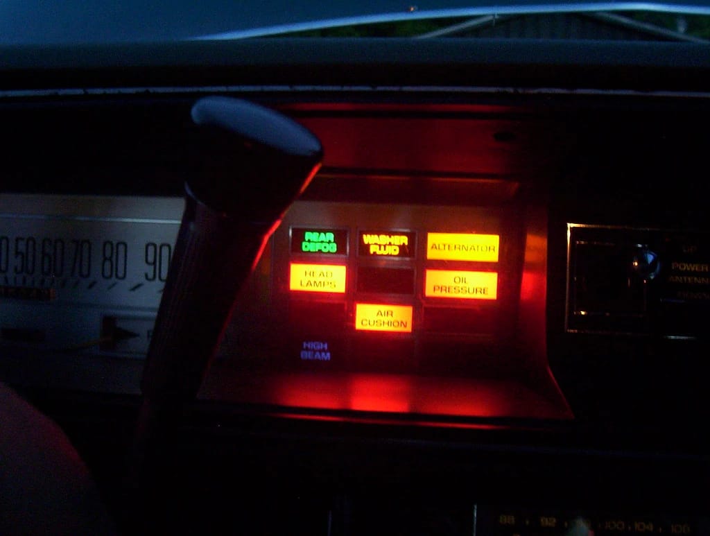 Illuminated dashboard warning lights of a 1975 Buick