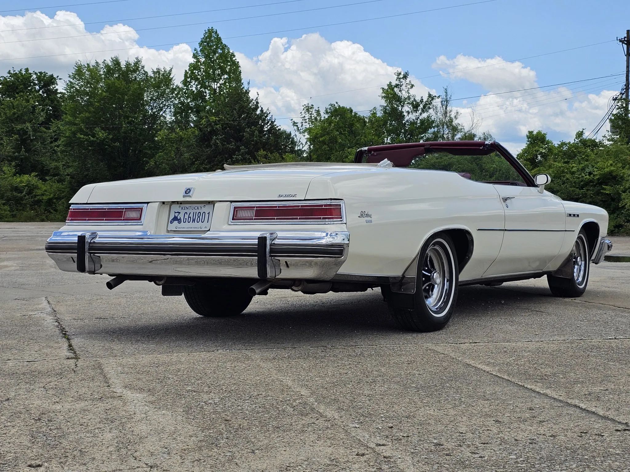 Right rear 3q view of a 1975 Buick convertible with the top down