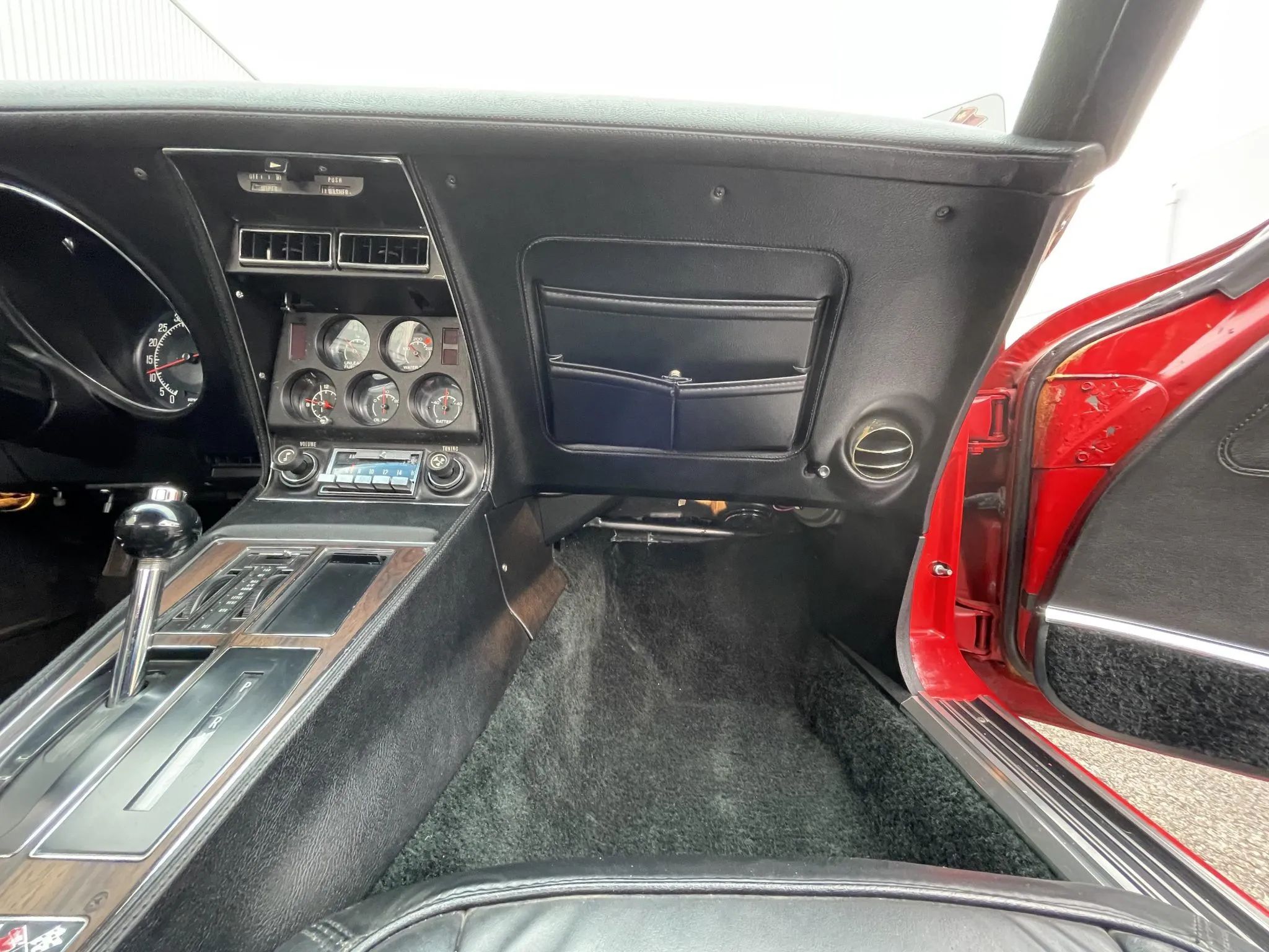 1975 Chevrolet Corvette L48 Convertible: Only 165 HP And Just 61 Miles On This Final-Year C3 Convertible 9 Passenger side of the dashboard of a 1975 Corvette convertible with black Custom interior