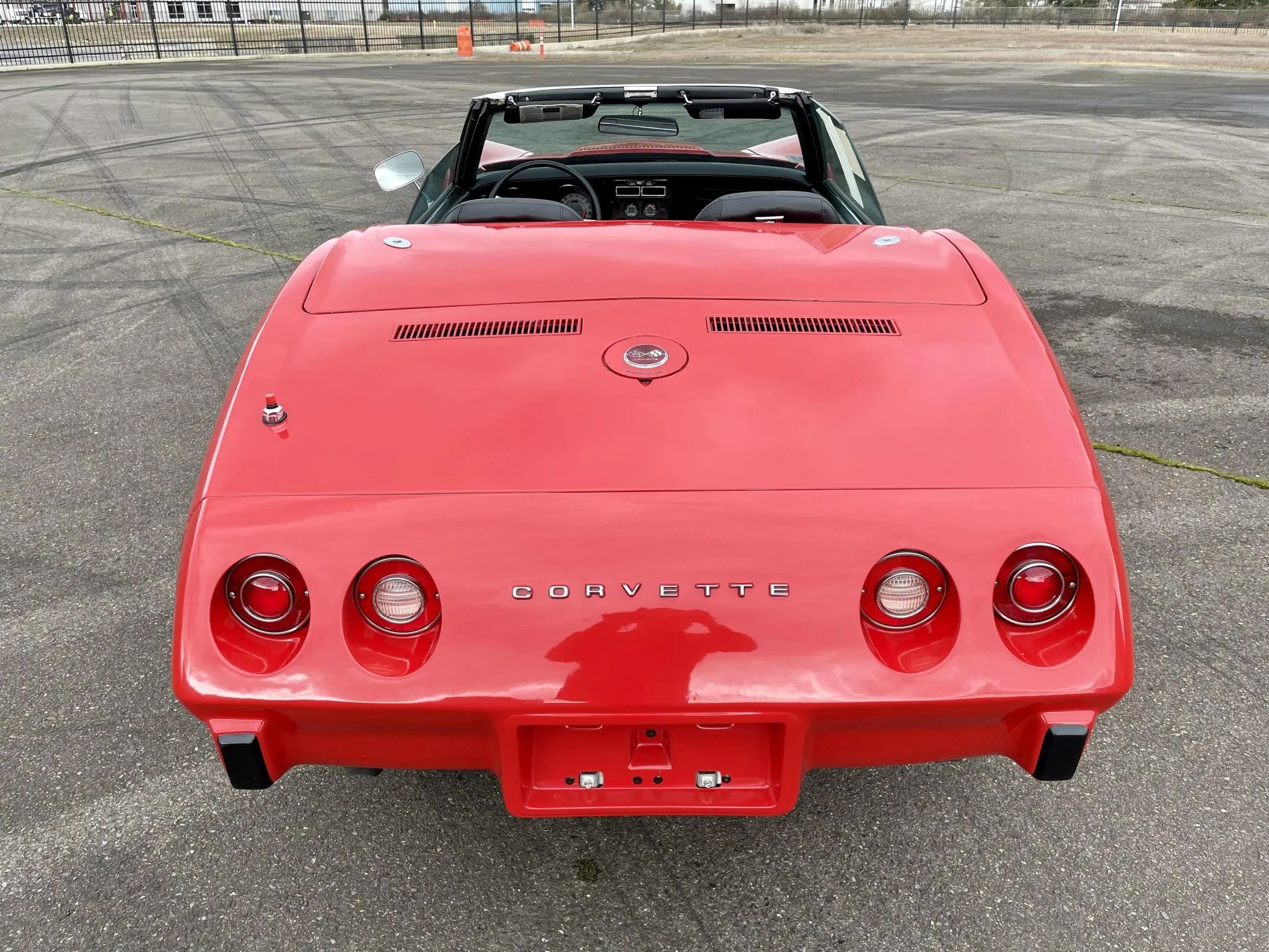 1975 Chevrolet Corvette L48 Convertible: Only 165 HP And Just 61 Miles On This Final-Year C3 Convertible 16 Rear view of a Mille Miglia Red 1975 Corvette convertible with the top down