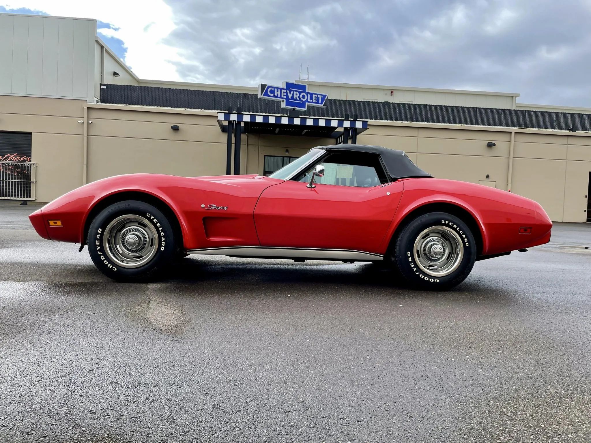 1975 Chevrolet Corvette L48 Convertible: Only 165 HP And Just 61 Miles On This Final-Year C3 Convertible 2 Low-angle left side view of a 1975 Corvette convertible with the top up