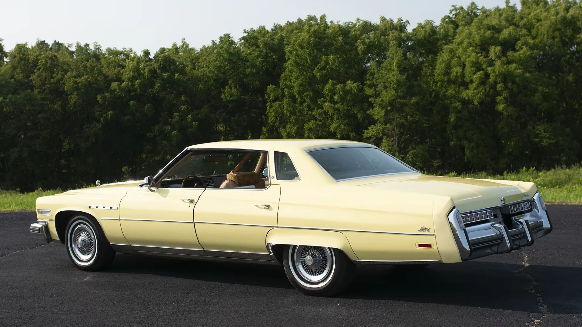 1976 Buick Electra Limited: The Last Buick 4-Door Hardtop Offered Excess In Moderation 4 Left rear 3q view of a yellow 1976 Buick four-door hardtop with the side windows down