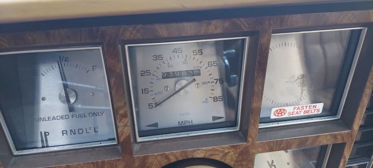 Silver-faced speedometer and instrument panel of a 1978 Buick Regal