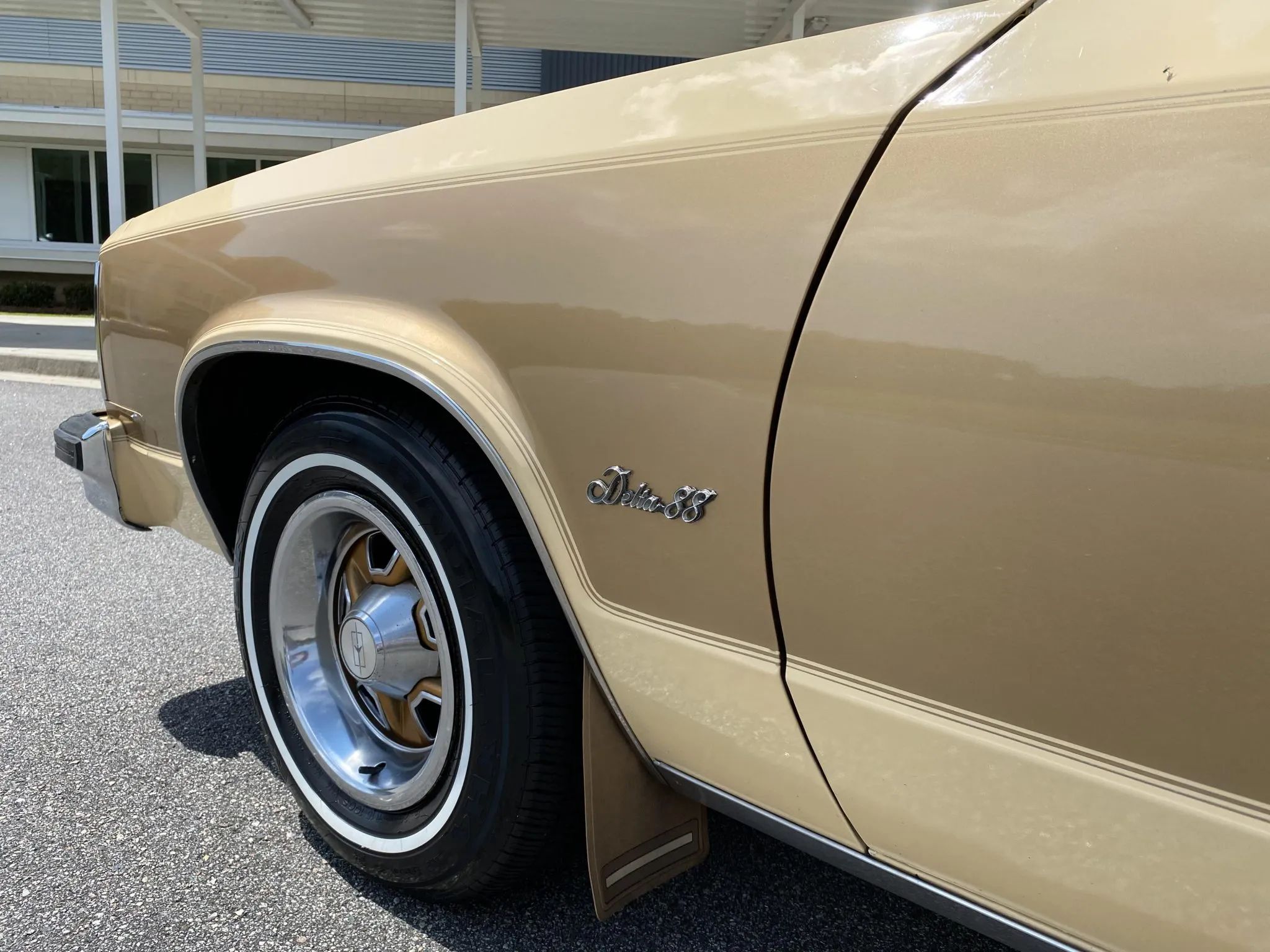 1978 Oldsmobile Holiday 88 Coupe: A Rare B-Body Olds With Bucket Seats And Center Console 19 Left front fender and wheel of a two-tone 1978 Olds 88