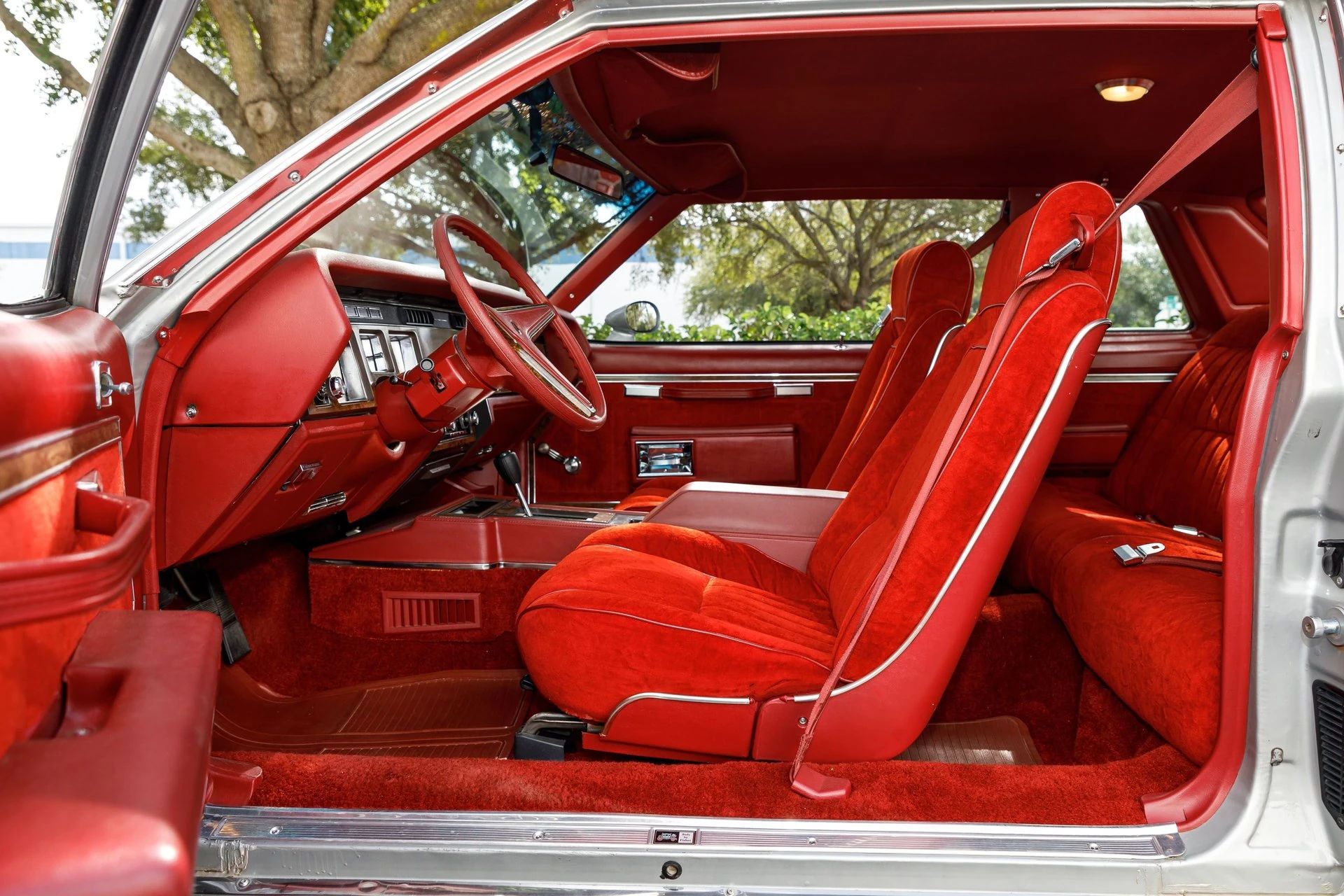 1979 Pontiac Bonneville Coupe: Rare And Plush Bucket Seat B-Body 11 Front seats of a 1979 Pontiac Bonneville, viewed through the driver's door