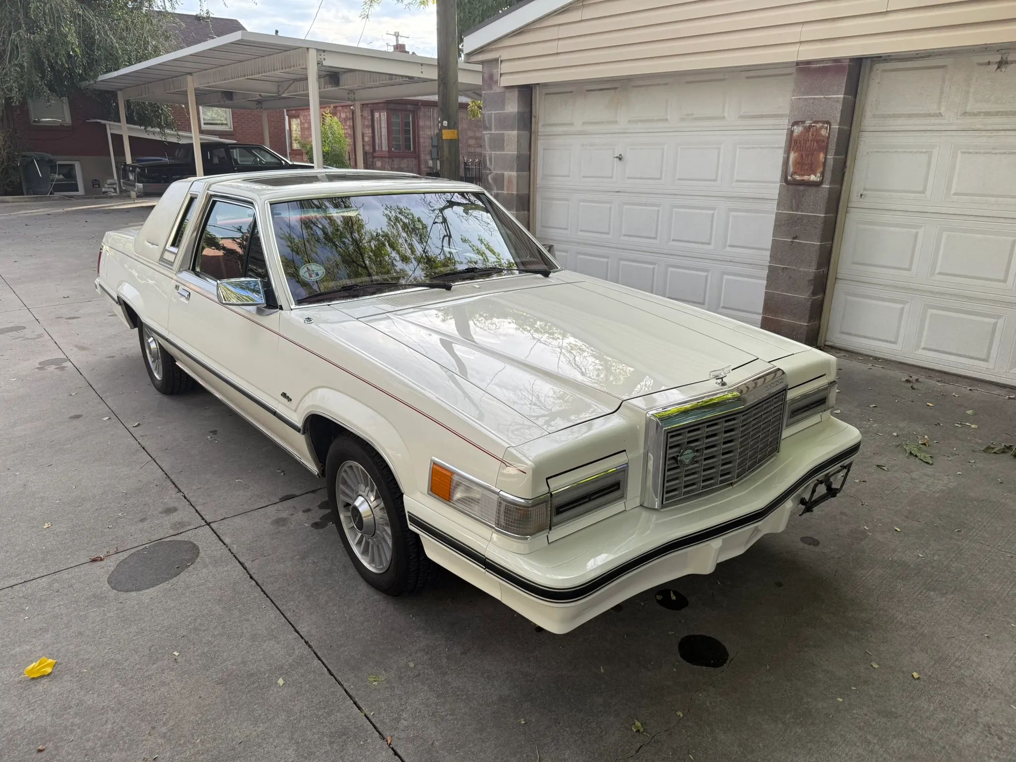 High-angle front 3q view of a Polar White 1982 Ford Thunderbird Heritage Edition