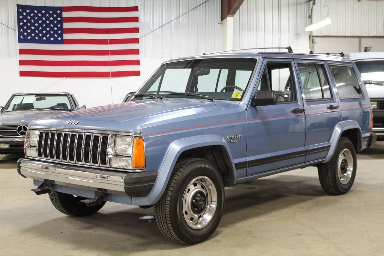 What's The Difference Between A Car And A Truck These Days? Here's How The NHTSA And EPA Define It 7 Left front 3q view of a 1984 Jeep Cherokee XJ in an indoor showroom