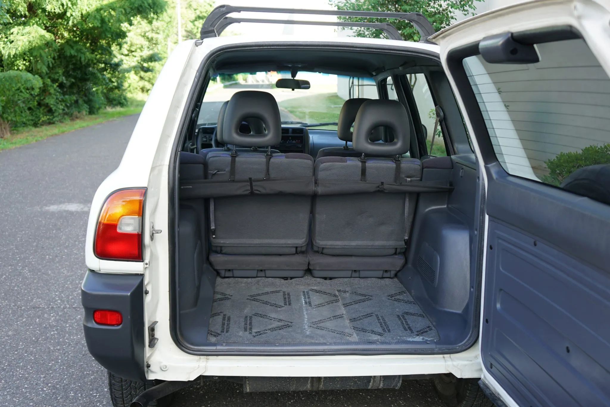 What's The Difference Between A Car And A Truck These Days? Here's How The NHTSA And EPA Define It 2 Rear cargo area of a Toyota RAV4
