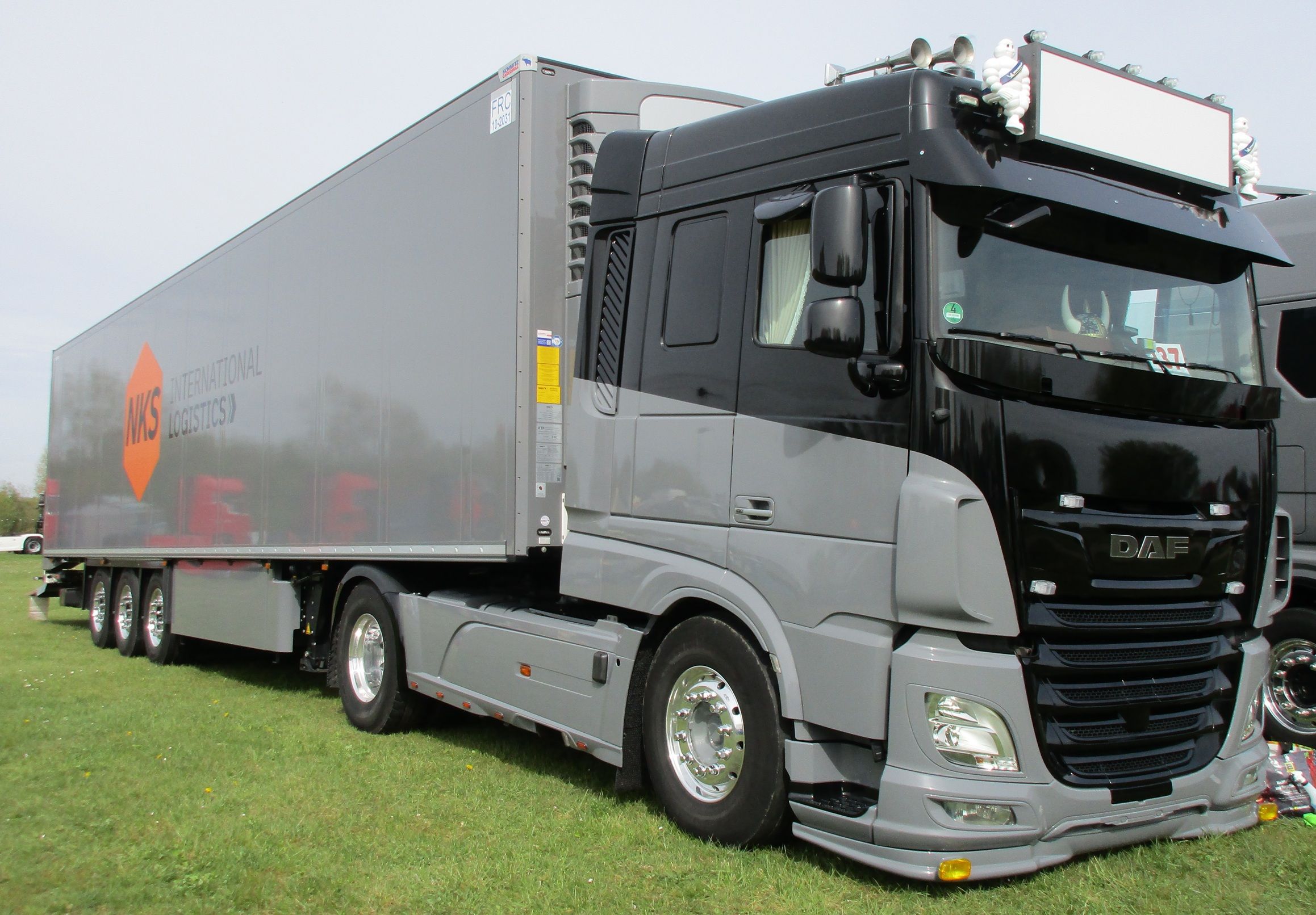 NKS International Logistics - DAF XF Space Cab 4x2 tractor with Schmitz Cargobull semi-trailer - 1