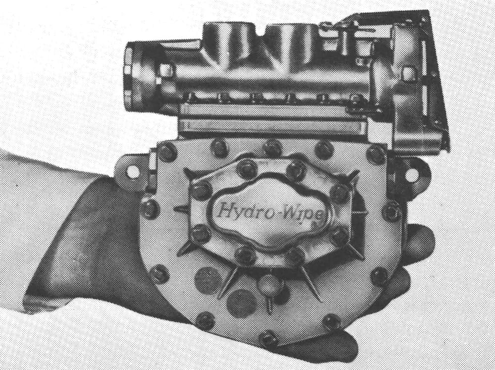 1966 Ford Thunderbird: Dream Car With A Space Age Interior To Let Your Inner Child Take Flight 25 B&W photo of a hand holding a Trico Hydro-Wipe motor