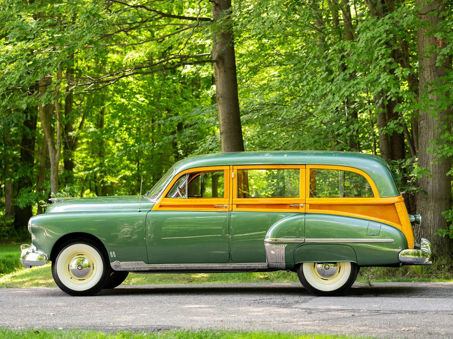 Left side view of a 1949 Oldsmobile station wagon