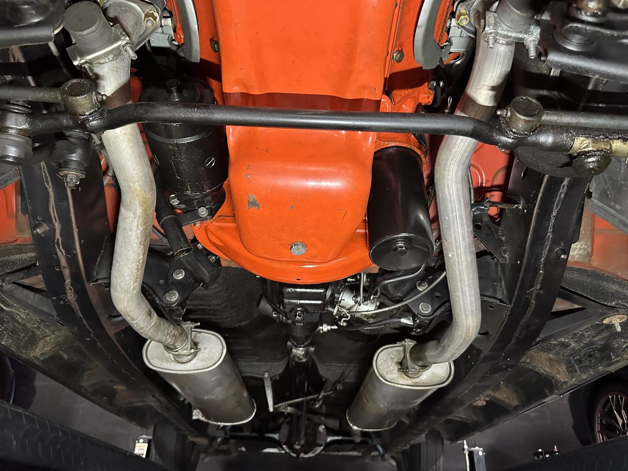 Underside of an engine with dual exhausts