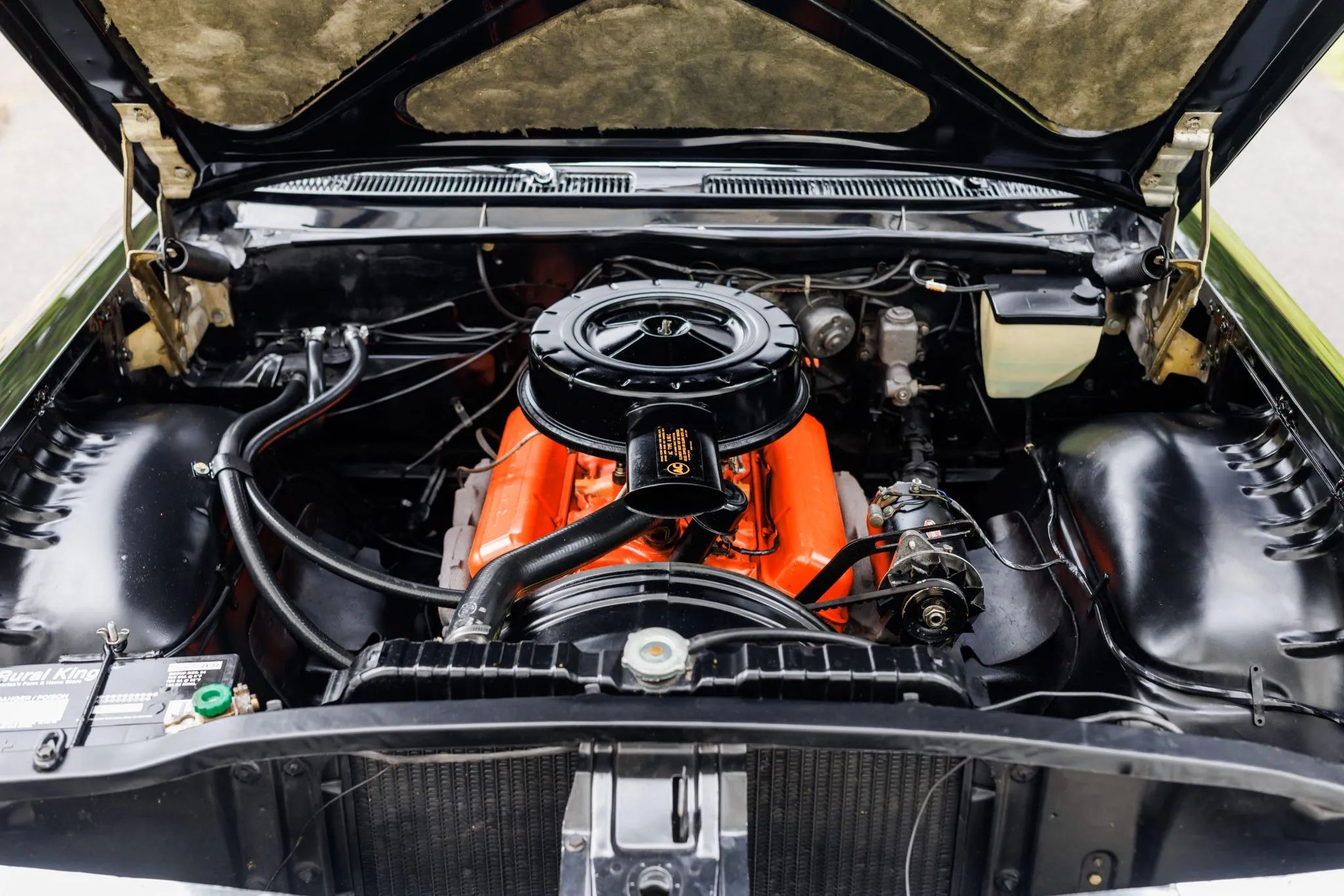 V-8 engine in a black 1961 Chevrolet