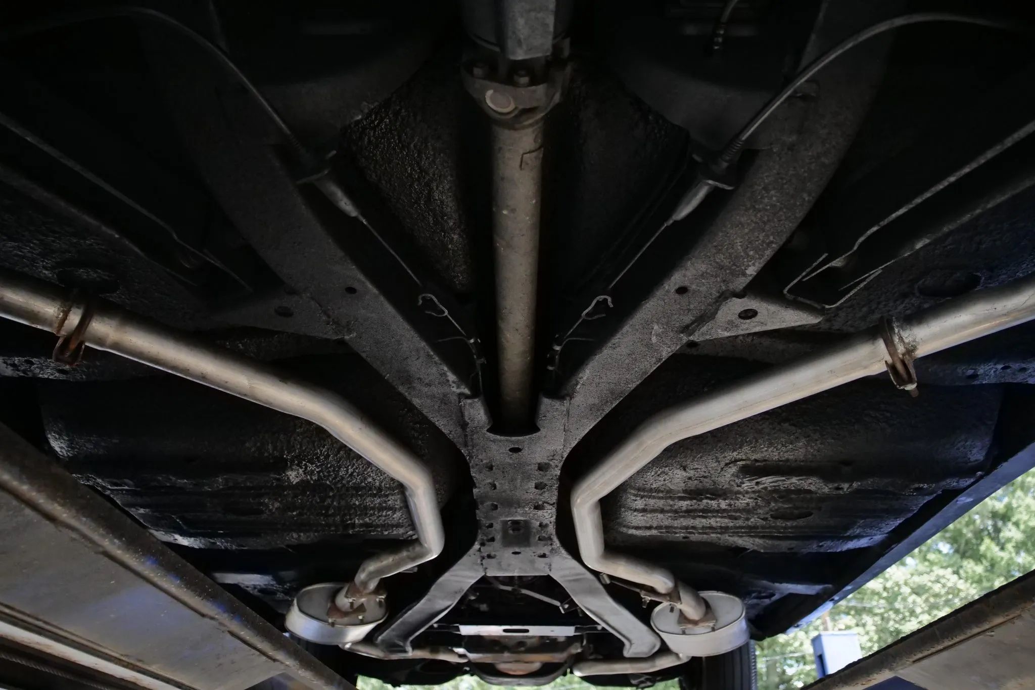 Dual exhausts under a car