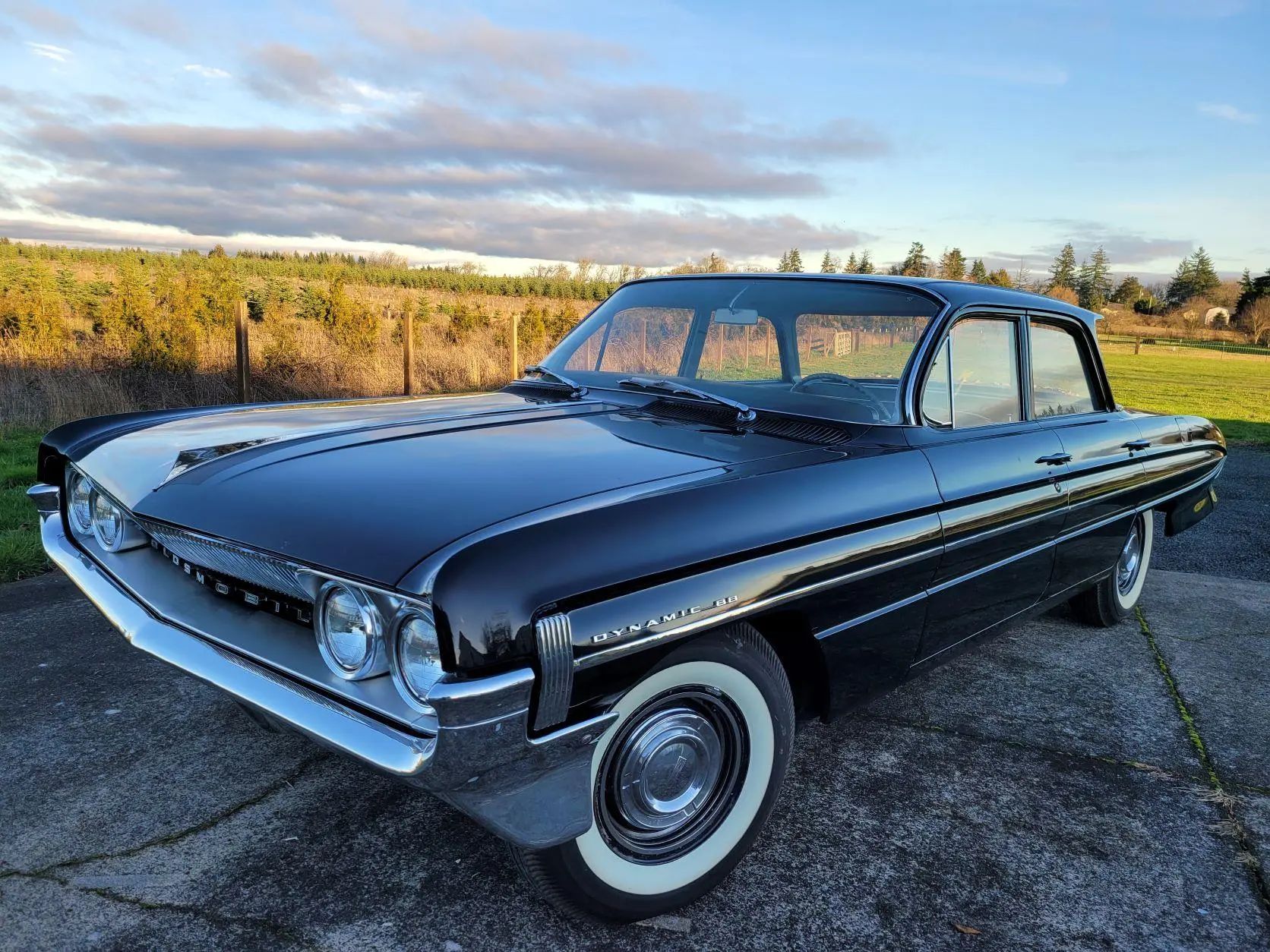 Left front 3q view of a 1961 Oldsmobile 4-door sedan