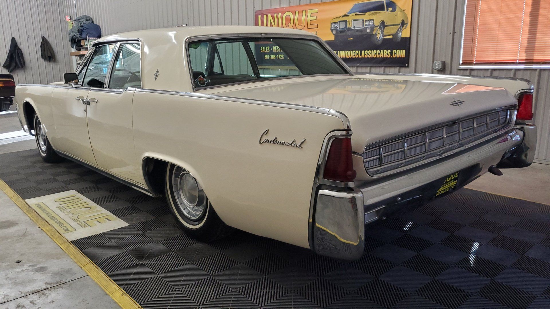 Deciphering The Build Sheets Of A 1960s Ford Thunderbird And Lincoln Continental 11 Driver's rear three-quarter picture of white 1963 Lincoln Continental Sedan
