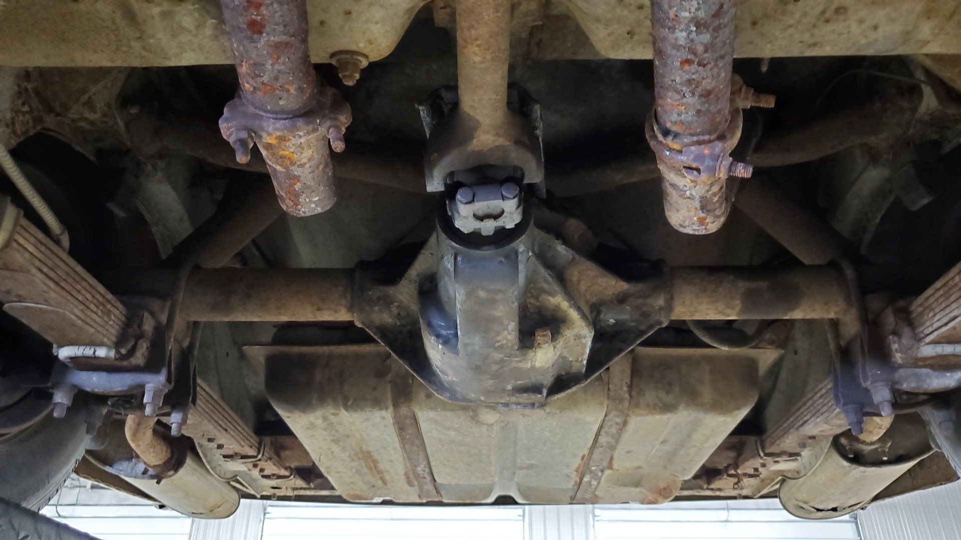 Deciphering The Build Sheets Of A 1960s Ford Thunderbird And Lincoln Continental 10 Undercarriage image of 1963 Lincoln Continental, focusing on the differential