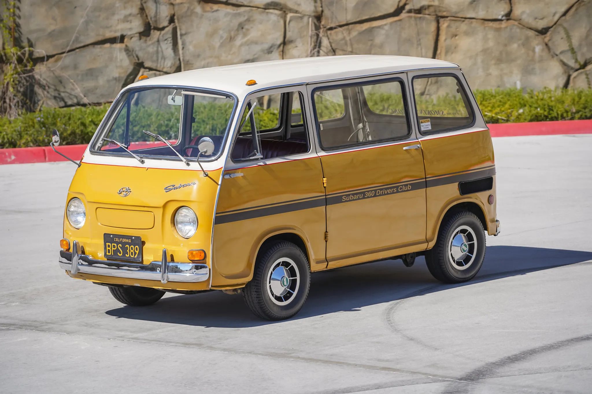 Left front 3q view of an white and orange 1969 Subaru keitora van