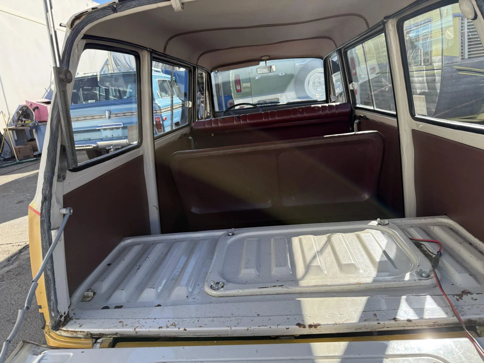 View through the back of a Subaru Sambar van with the tailgate open