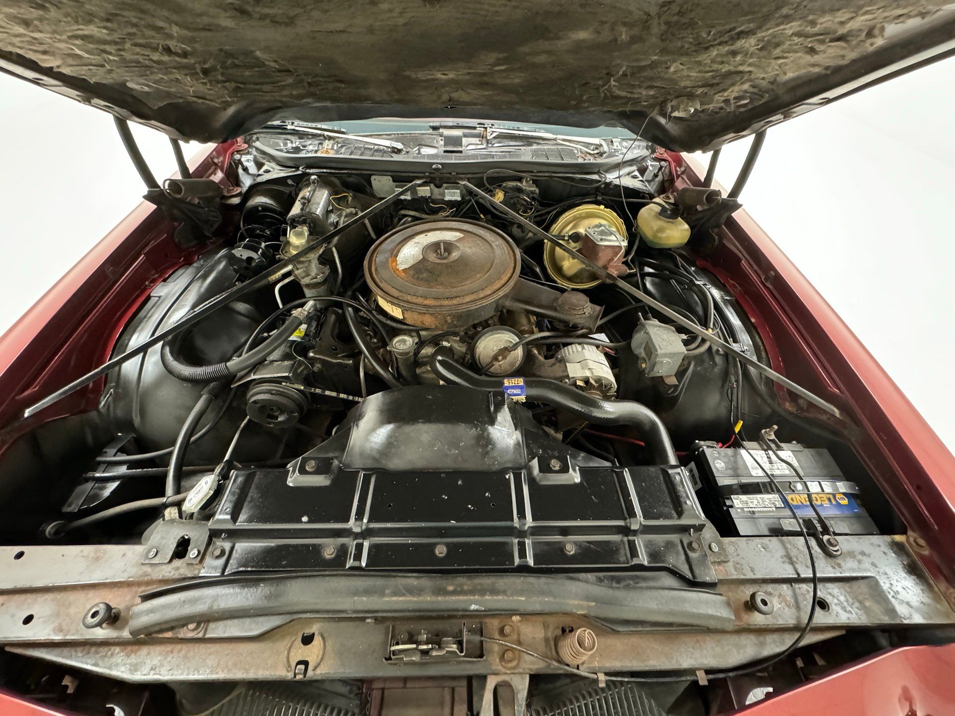 V-8 engine under the hood of a 1973 Oldsmobile