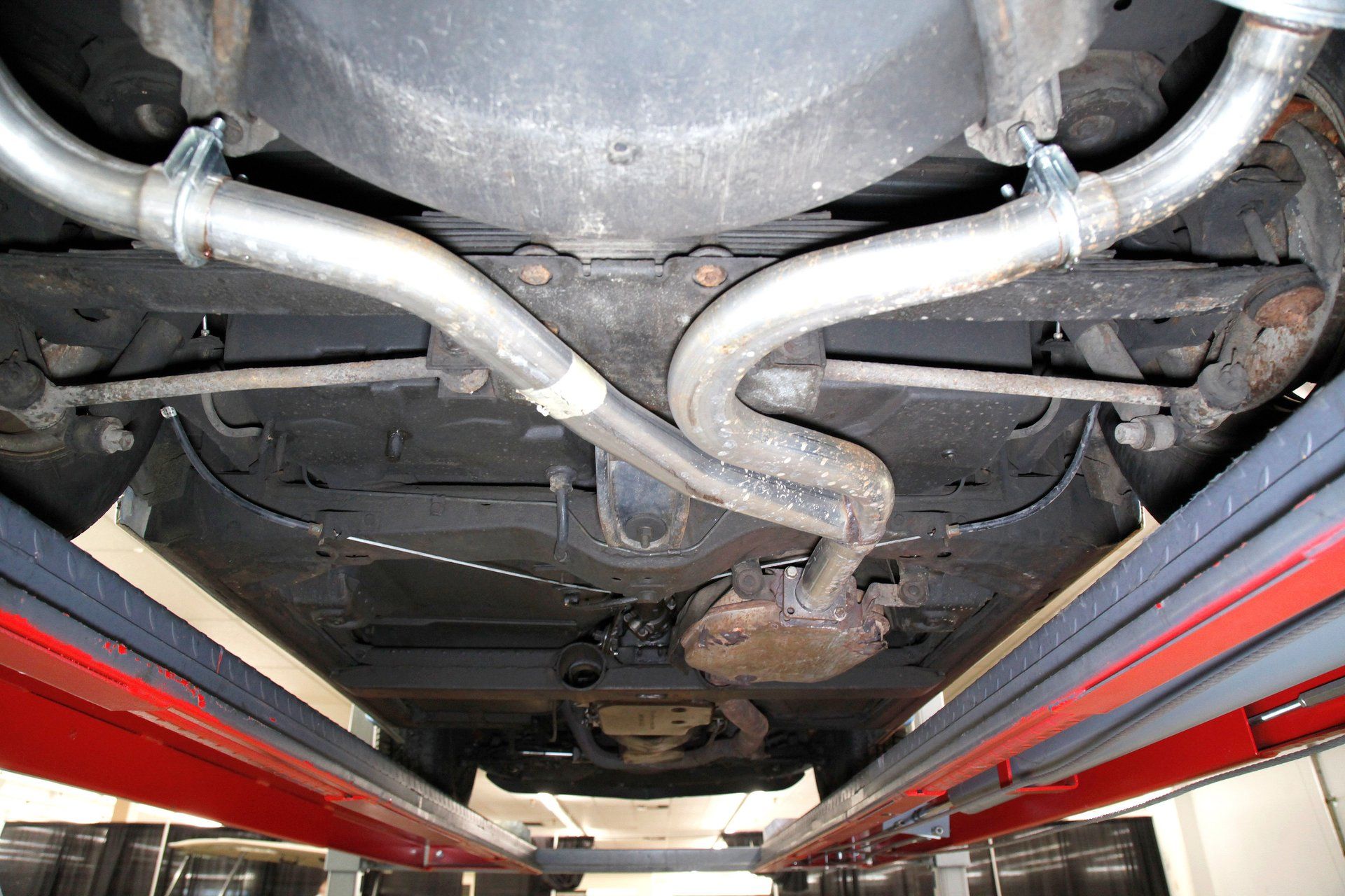 Exhaust pipes under a 1975 Corvette