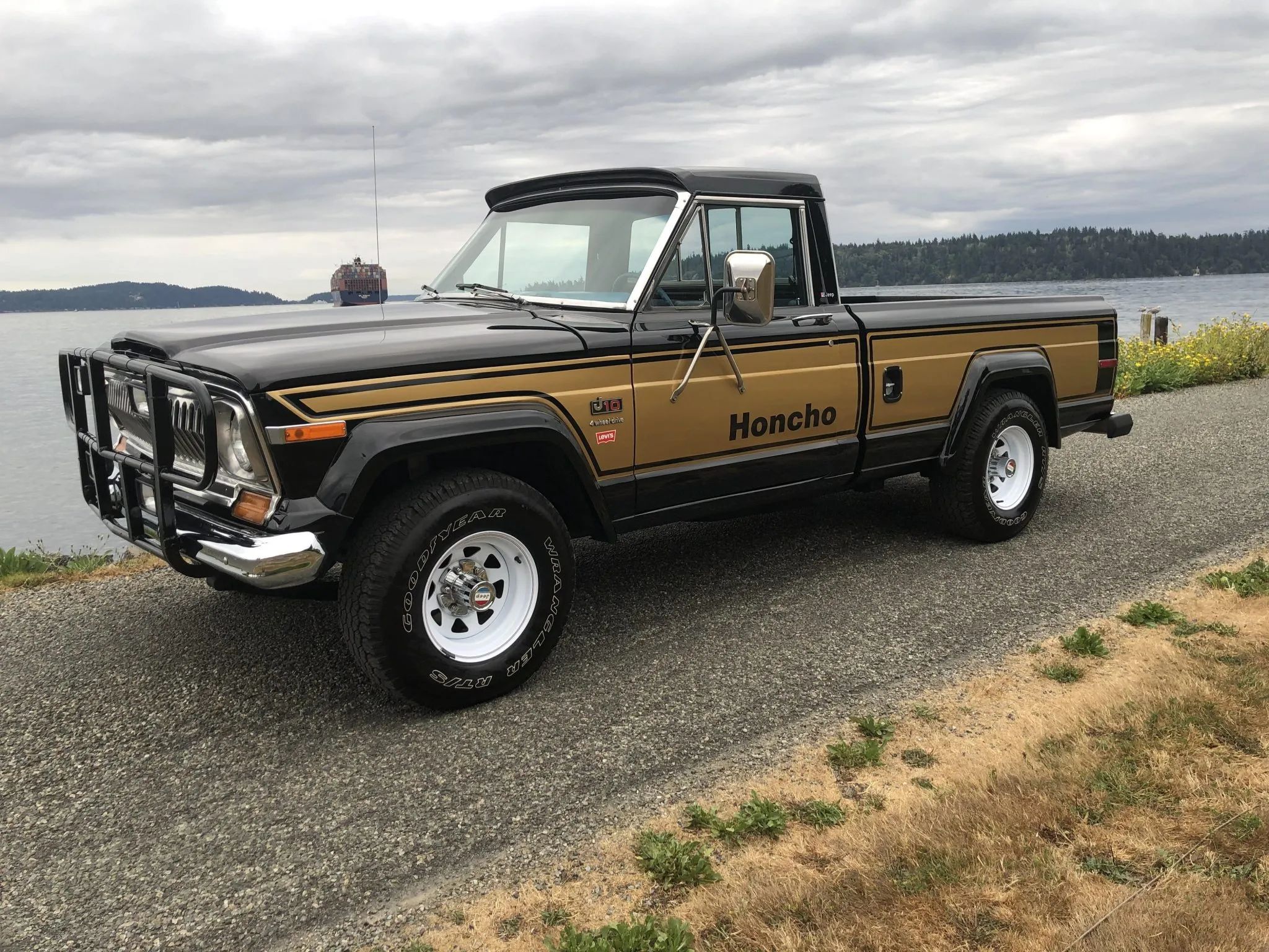 1976–1983 Jeep J-10 Honcho Pickup: Wild Decals, Attitude, And Levi’s Interior In A “Mucho Macho” Jeep Special Edition 5 Black 1977 Jeep J-10 Honcho from driver's side