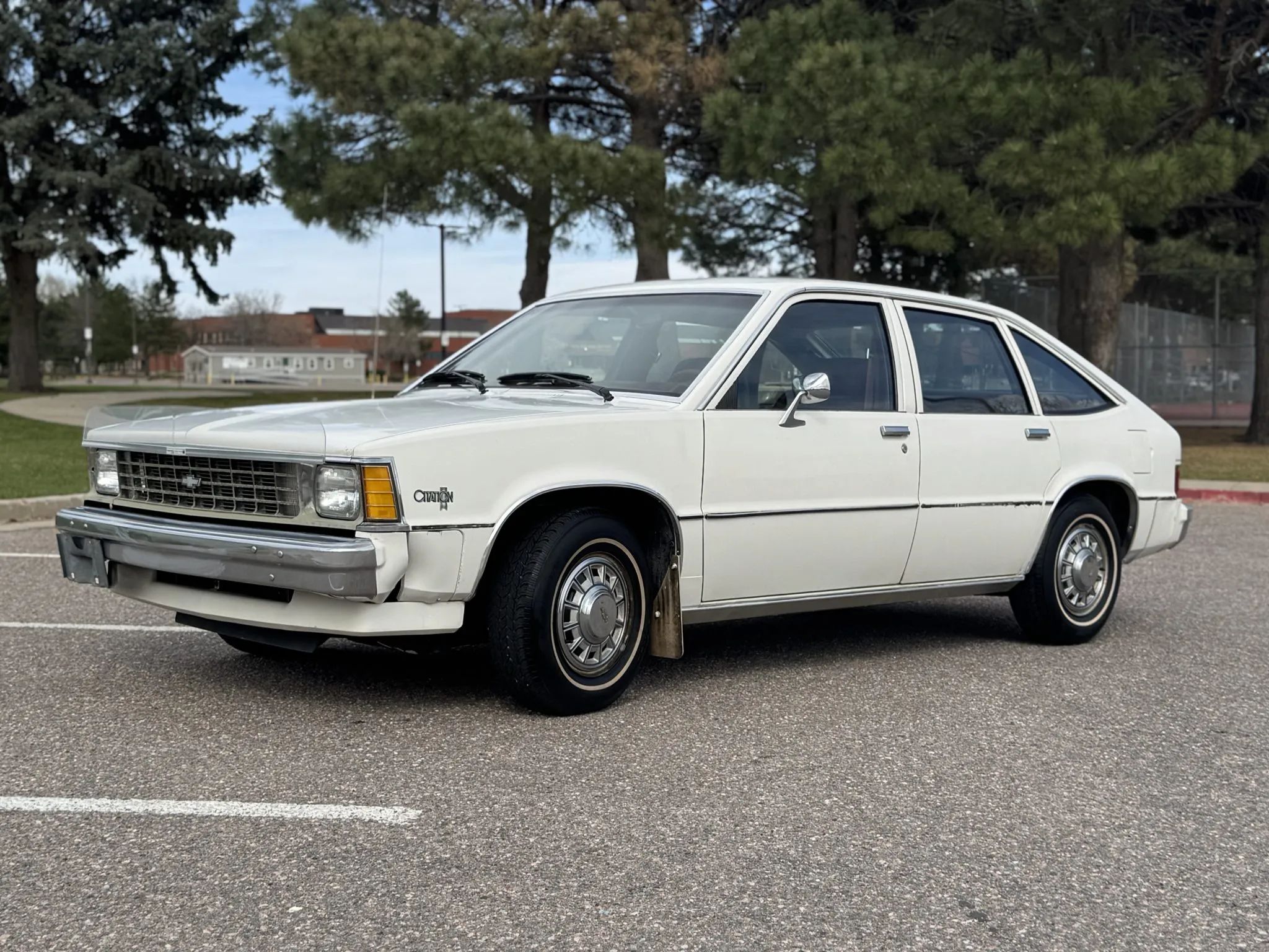 1981 Chevrolet Citation 4-Speed Hatchback: A Well-Preserved Example Of GM's Greatest Failure 1 Left front 3q view of a white 1981 Chevrolet Citation four-door hatchback sedan