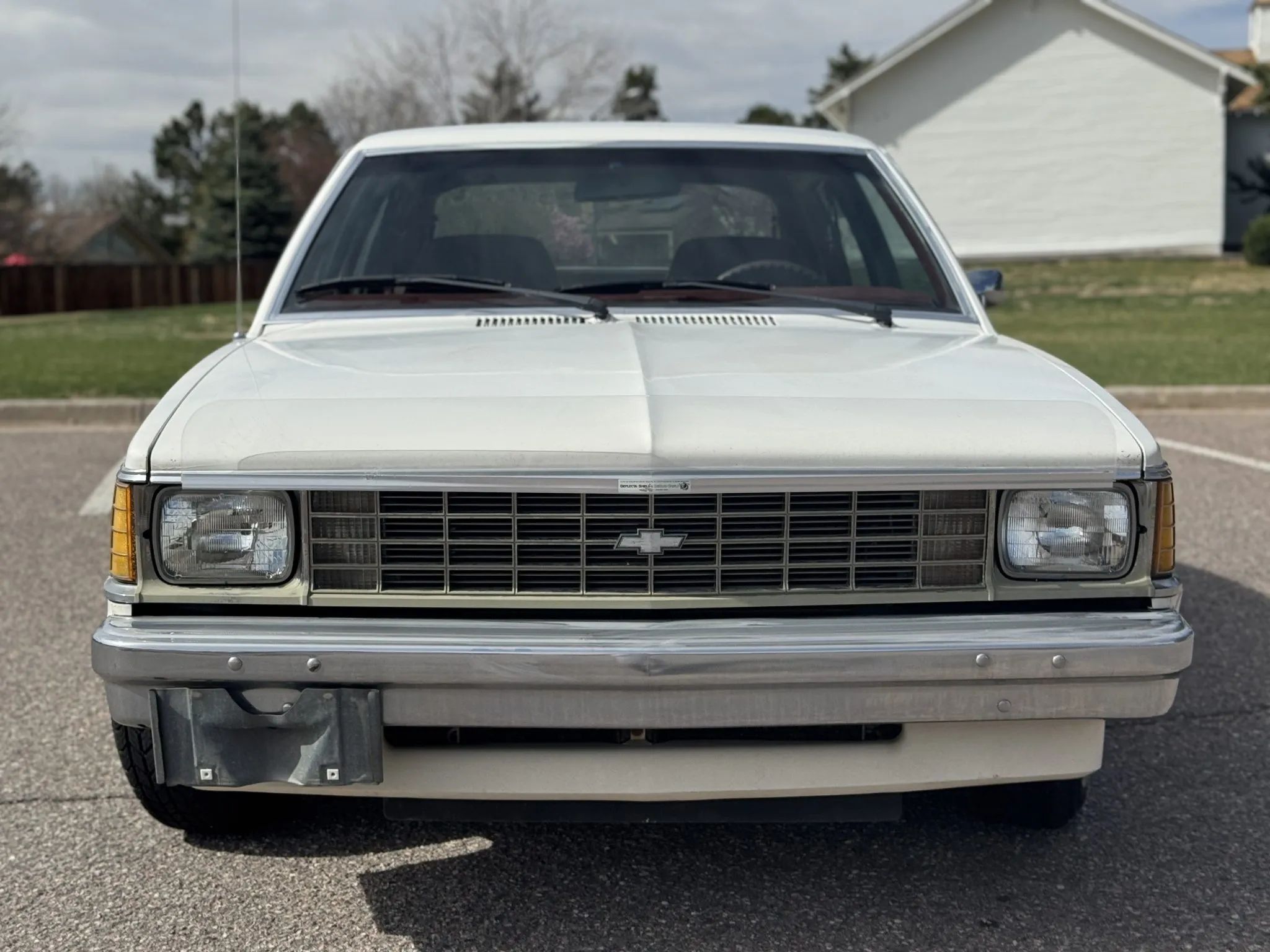1981 Chevrolet Citation 4-Speed Hatchback: A Well-Preserved Example Of GM's Greatest Failure 6 Front view of a 1981 Citation, with a plastic bug deflector attached to the leading edge of the hood
